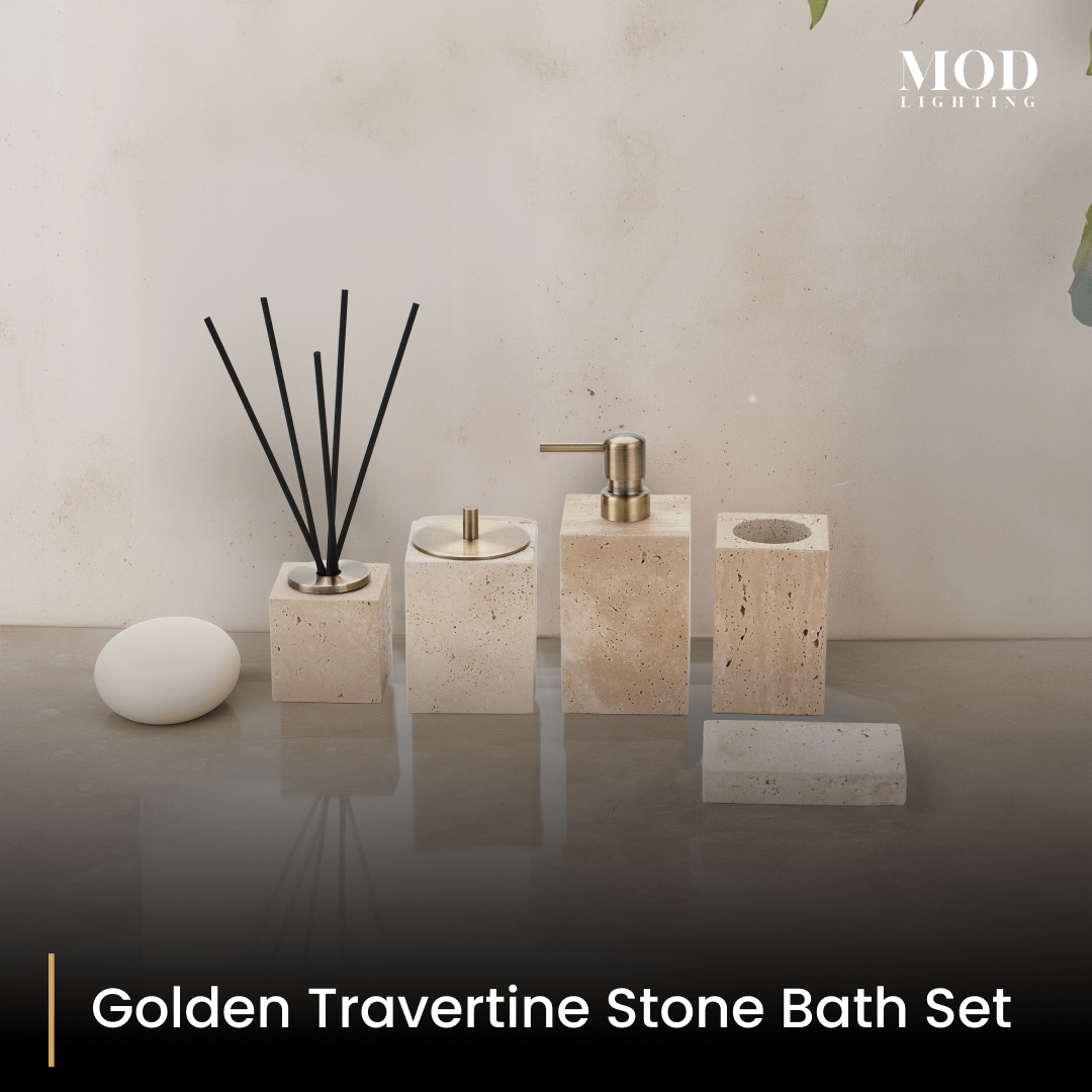 Golden Travertine Stone Bath Set: reed diffuser, cotton jar, soap pump and toothbrush holder lined up on a counter