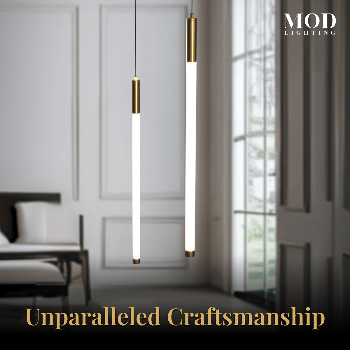 Kasper single slim vertical LED pendant with gold caps, glowing warm white in a bright room