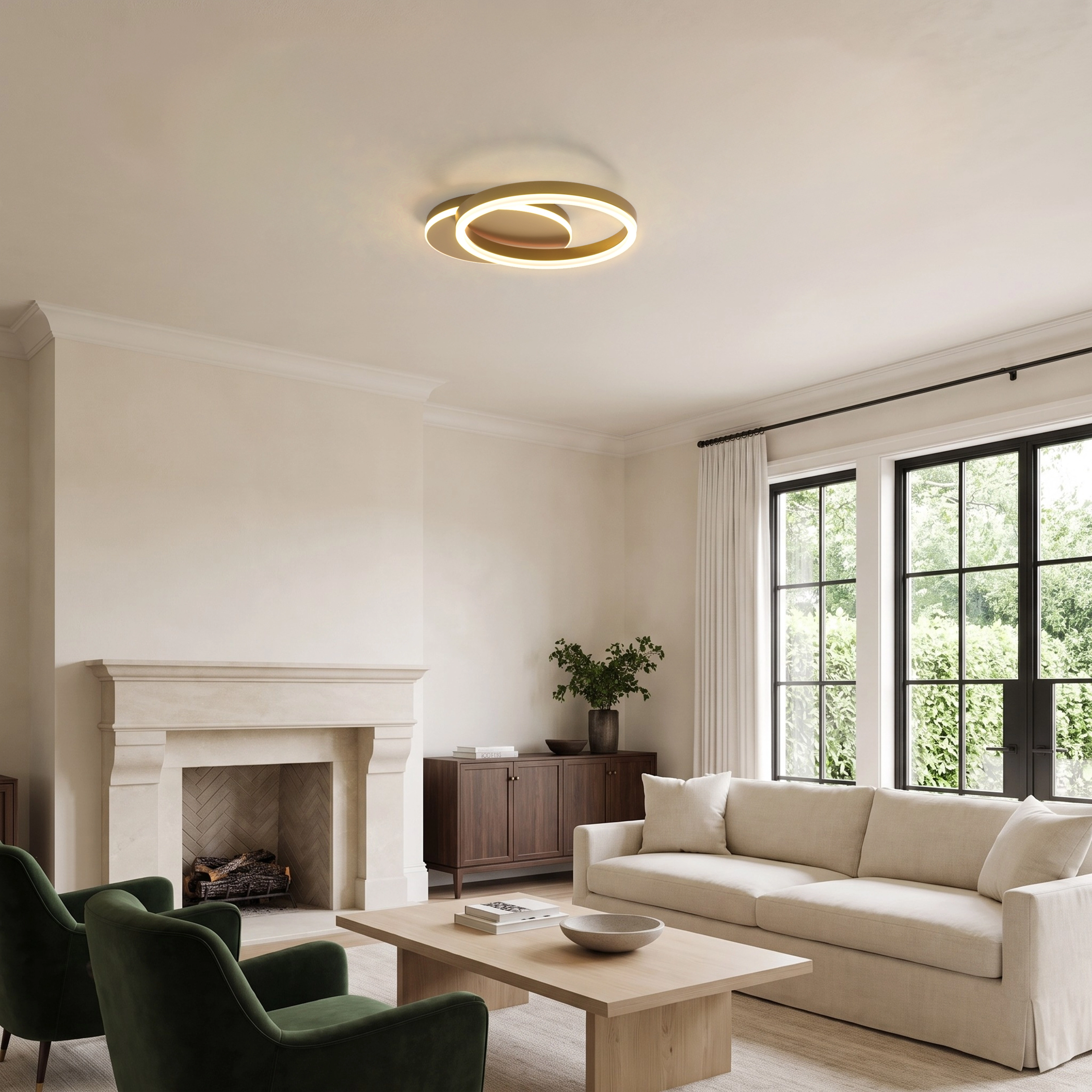Chloe Smart gold ceiling light with 2 circles in a living room with a fireplace
