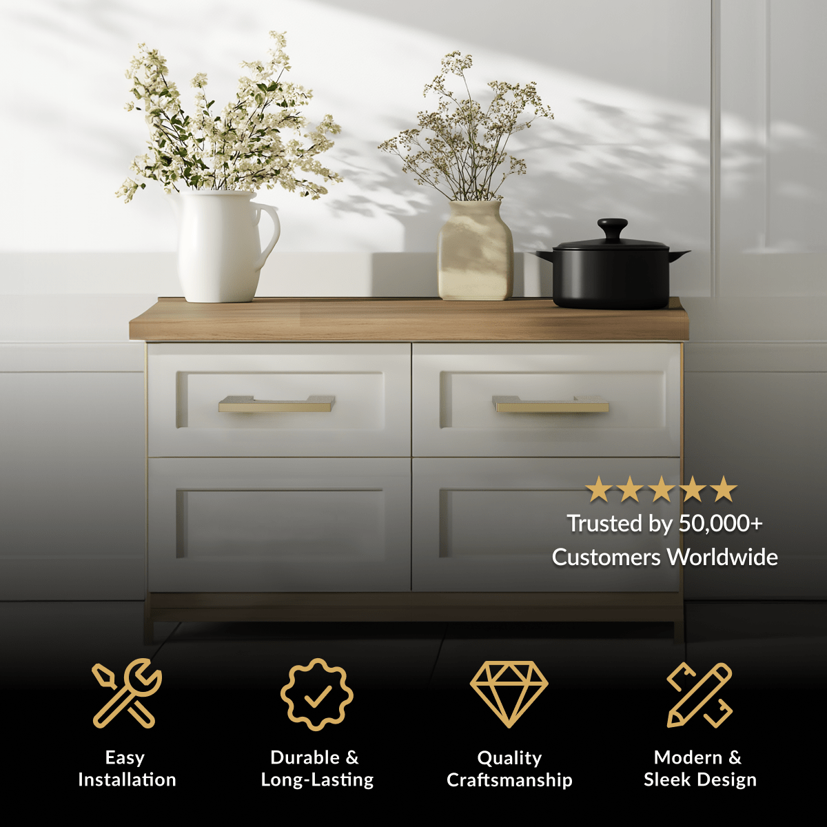 Maddison Cabinet Pull in brushed gold on a white kitchen cabinet with wood countertop