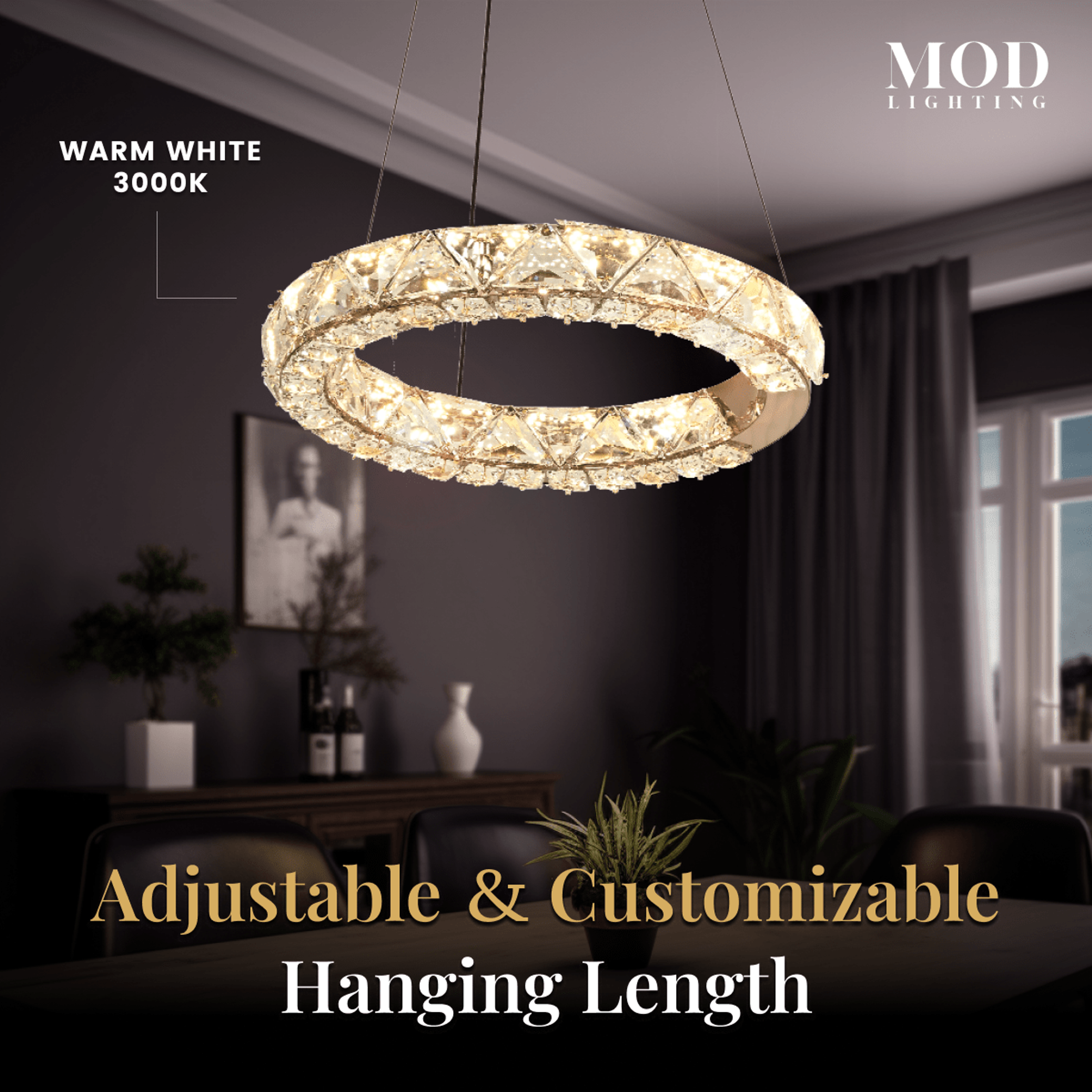 Jana warm-white crystal ring chandelier lit in a dim living room, adjustable hanging length