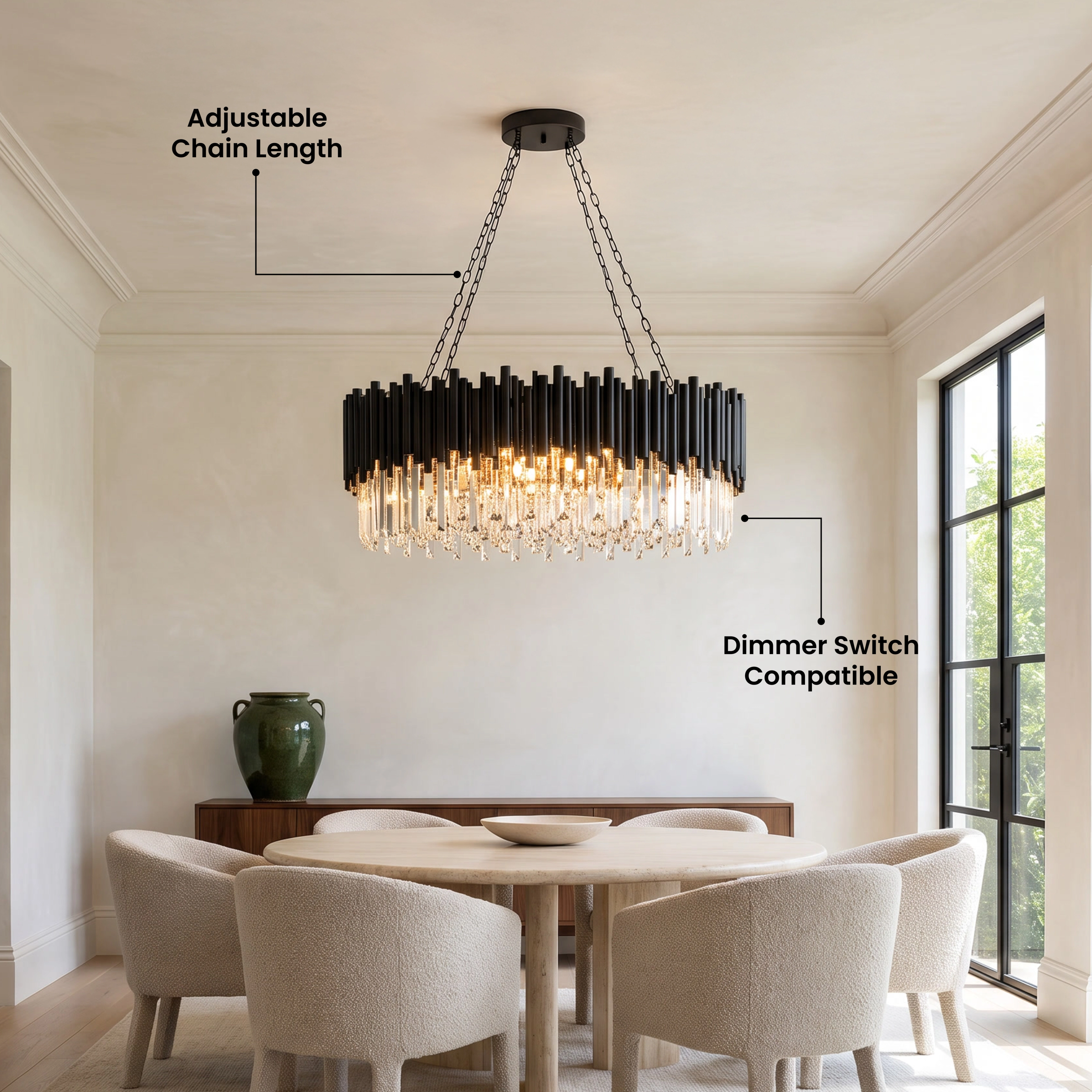 Obsidian crystal chandelier, black frame with tiered crystals, warm white, above a living room sofa