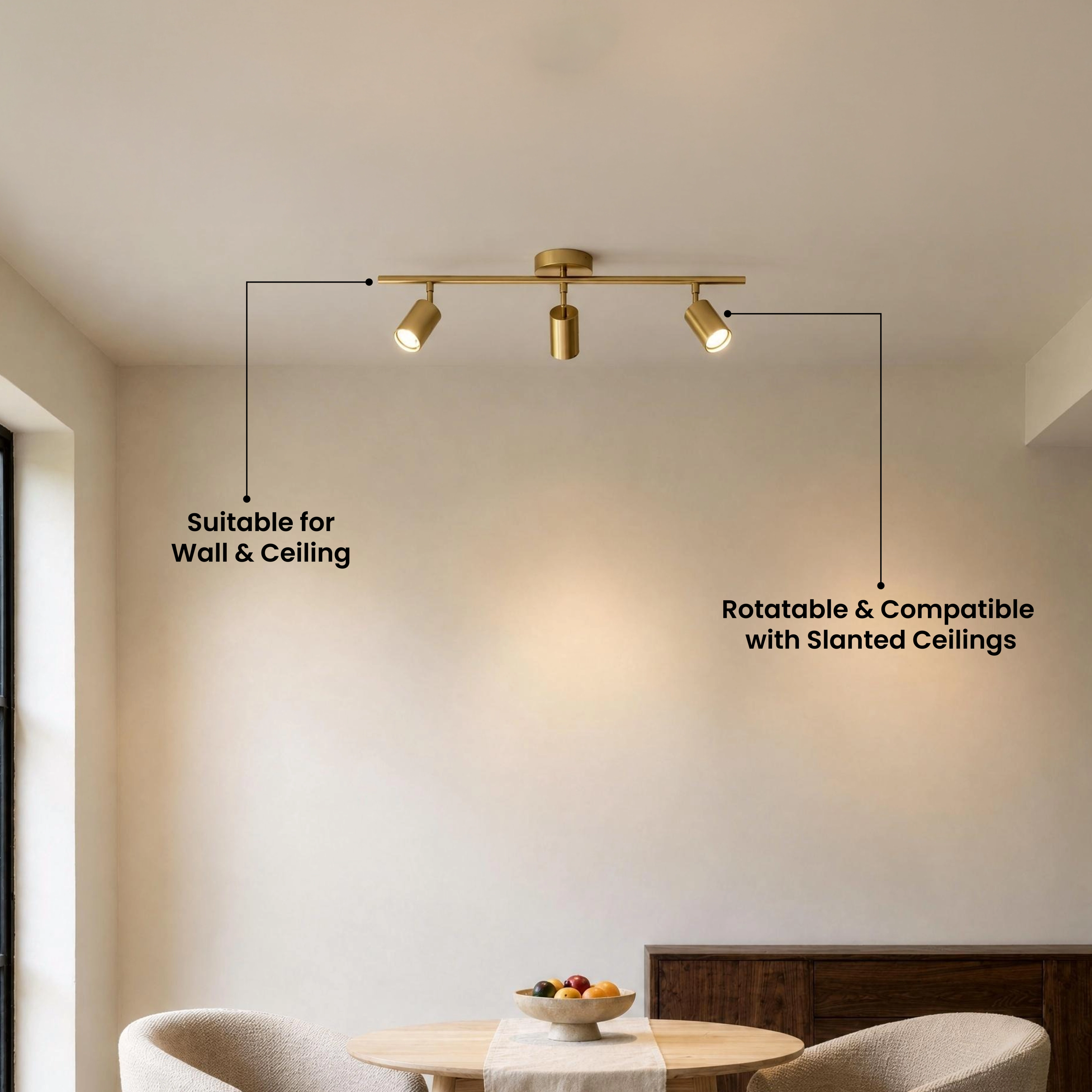Harris brushed-gold track lights, two adjustable cylinder spotlights on a dark walk-in closet ceiling