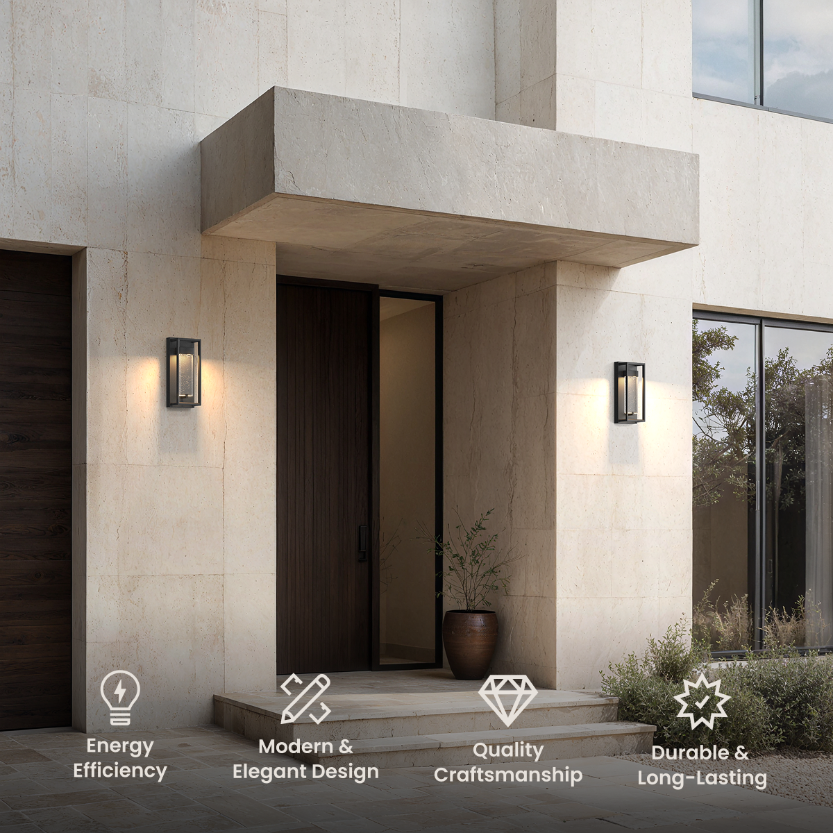 Aura outdoor sconces, open black frames with a lit crystal center flanking a wood entry door