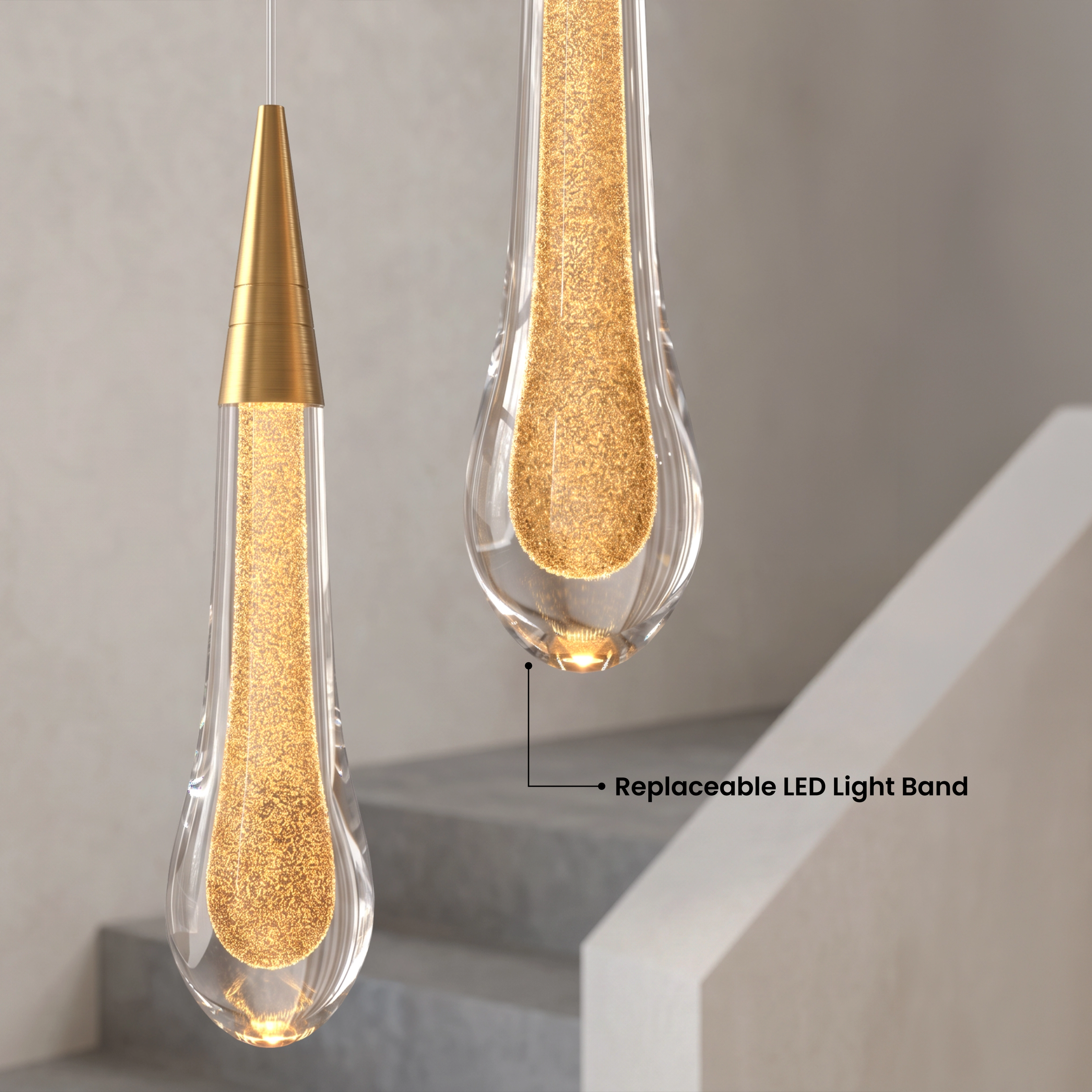 Indra chandelier, warm white 3000K crystal teardrops cascading along a curved staircase wall