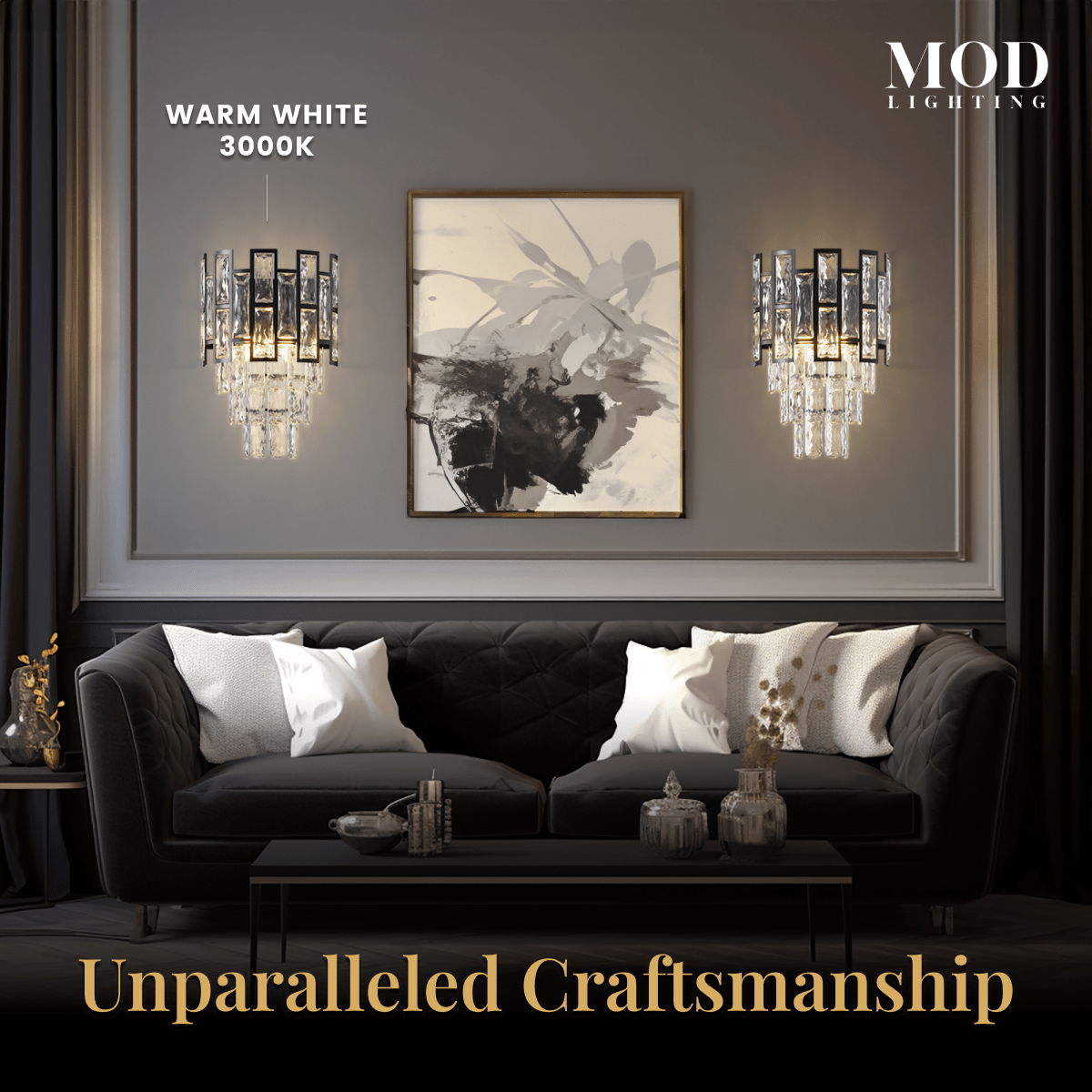 Raven black crystal sconce pair flanking framed art in a living room, warm white 3000K, over a black sofa