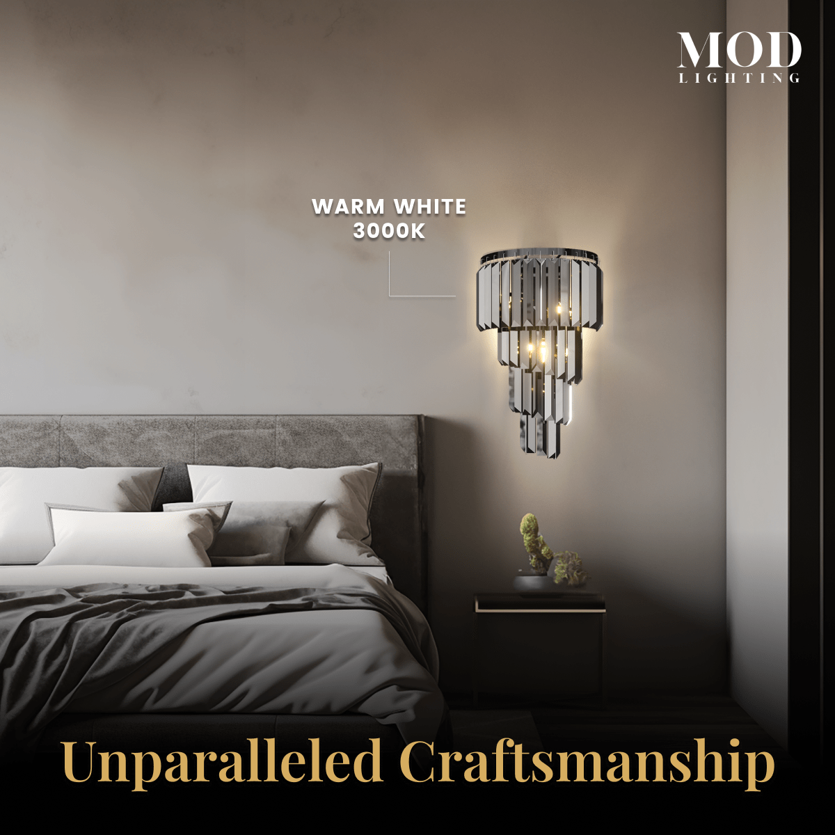 Umbra tiered crystal sconce in warm white 3000K light beside a bed, on a stone wall