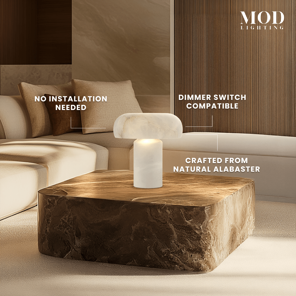 Ora Table Lamp glowing on a wood coffee table; notes no installation needed, dimmer-compatible, natural alabaster
