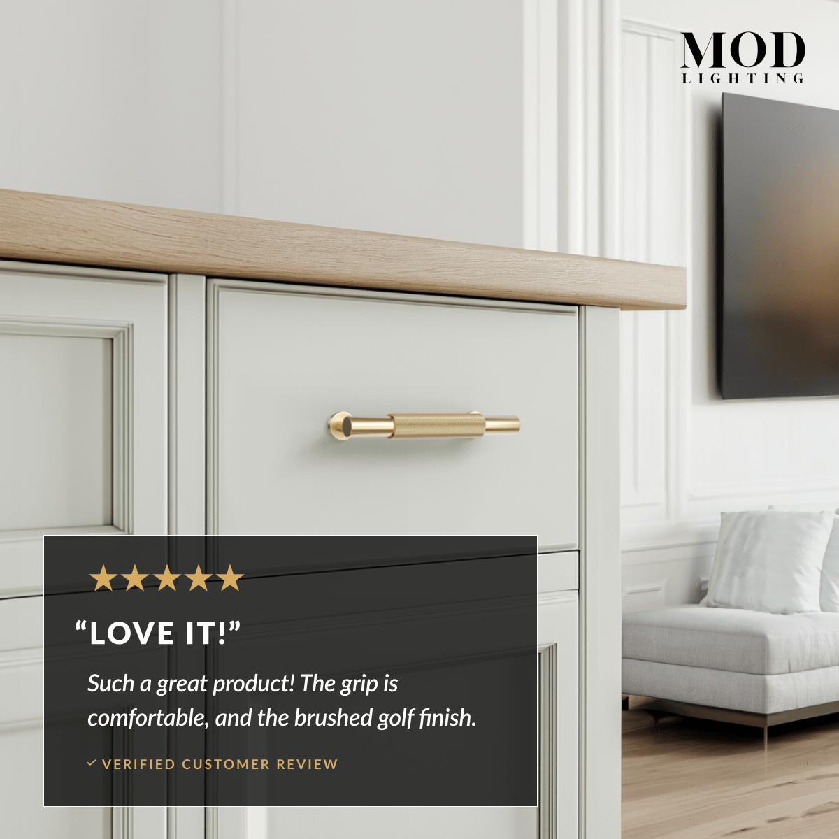 Wellesley brushed-gold cabinet pull mounted vertically on a light kitchen drawer, with a five-star customer review card
