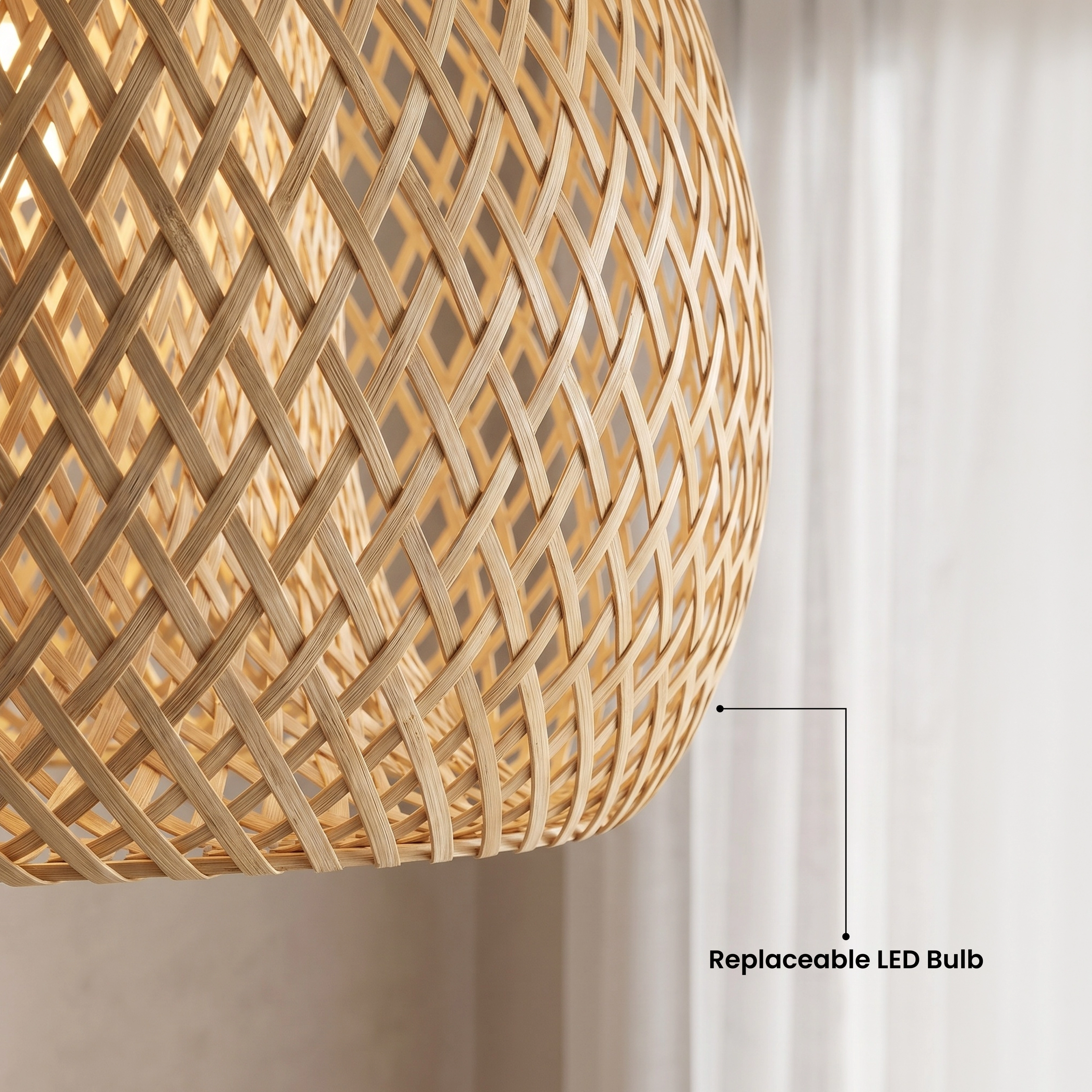 Amara bamboo dome pendant, rounded woven disc form, over a dining table in warm white, 3000K