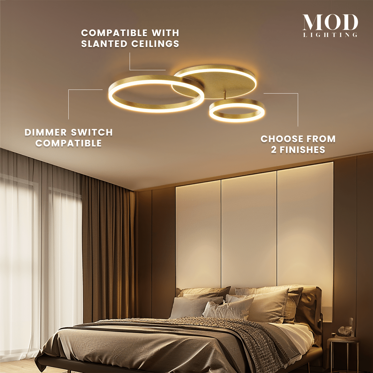 Chloe ceiling light, gold interlocking LED rings mounted above a bed