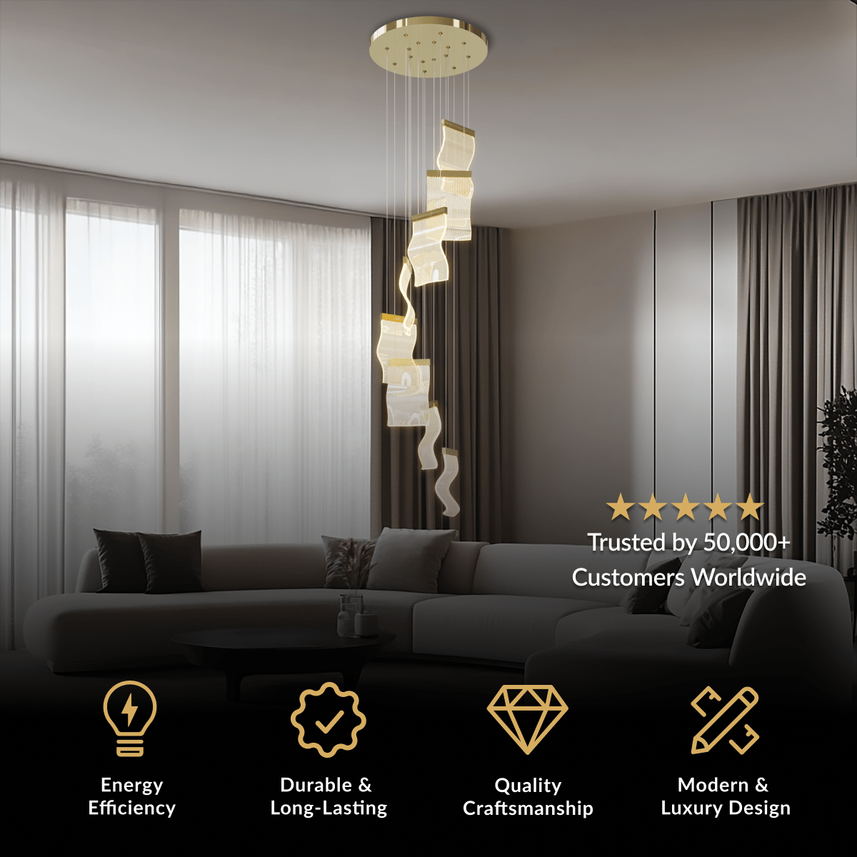 Helia long cascading gold spiral chandelier suspended down a double-height living room