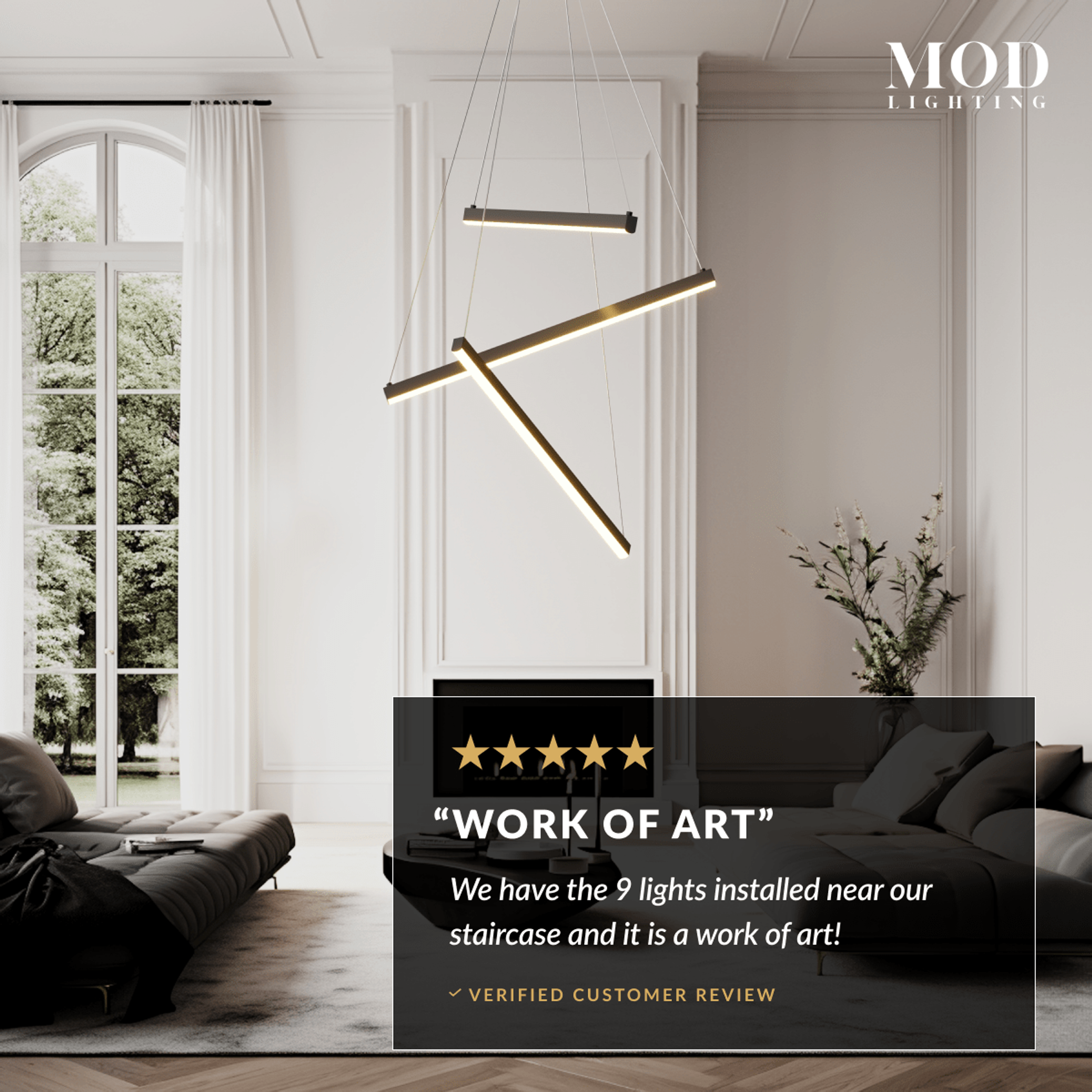 Finn black spiraling light-bar chandelier by tall windows in a living room, with five-star customer review