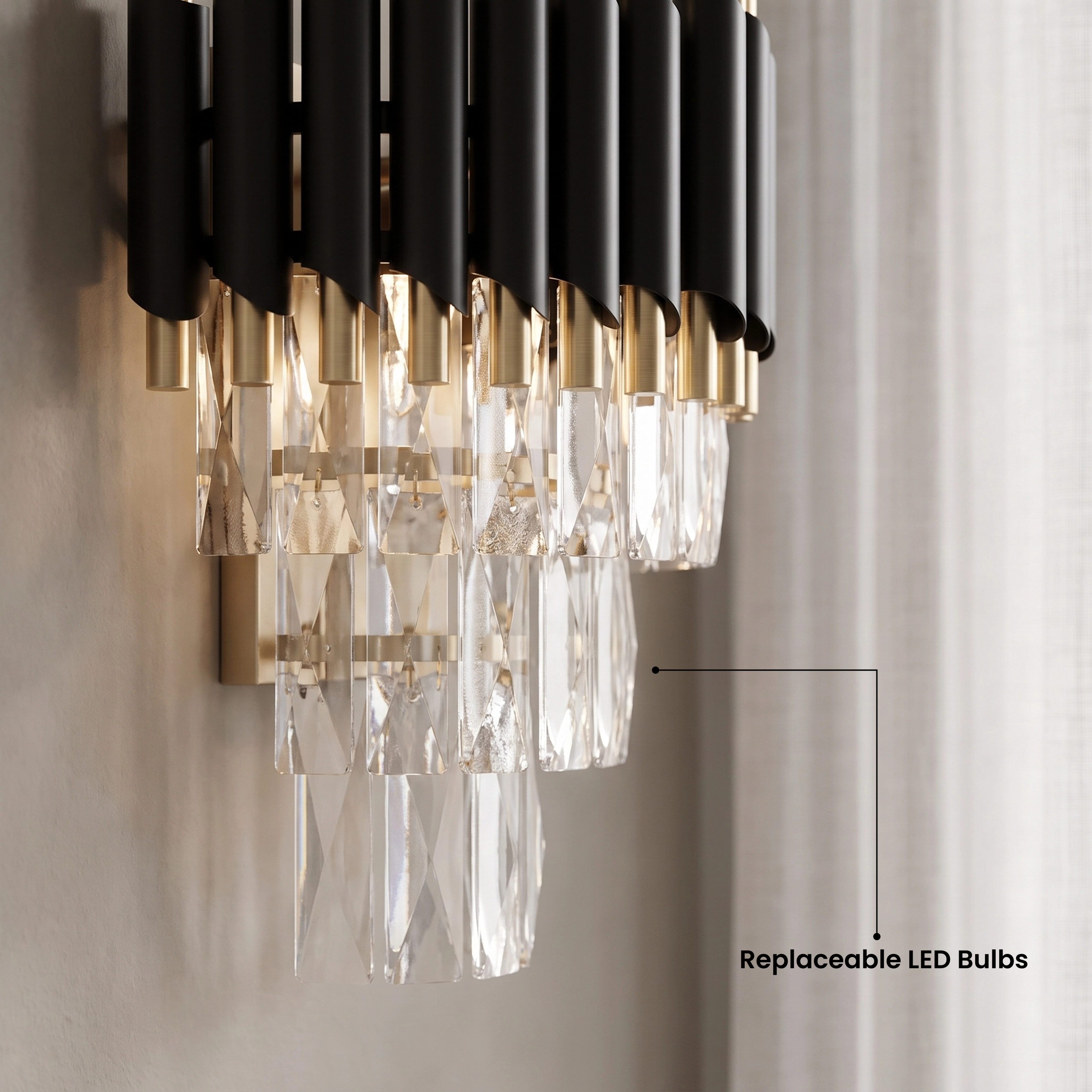 Onyx black and gold crystal wall sconces flanking marble wall art above a sofa, warm white 3000K