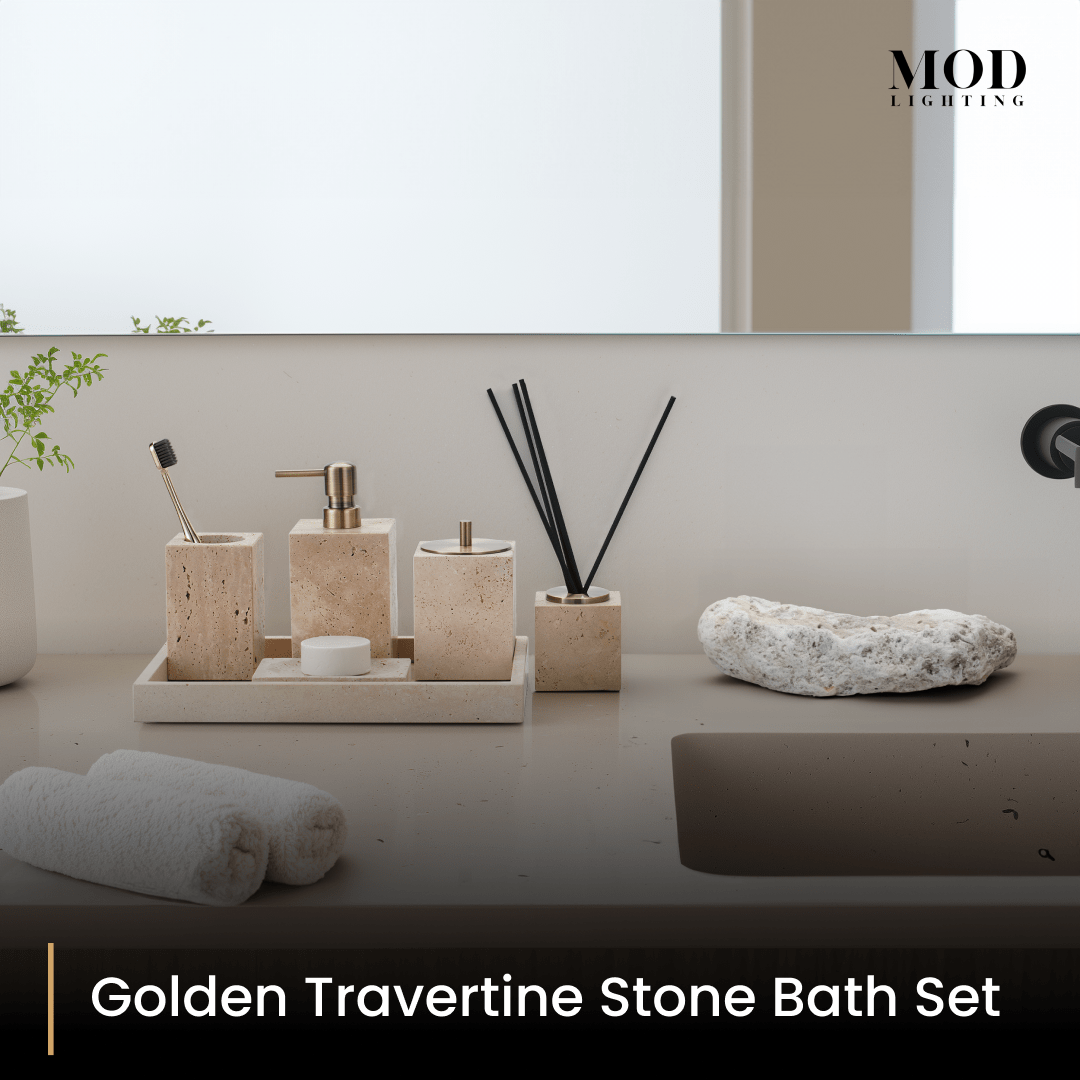 Golden Travertine Stone Bath Set arranged on a tray beside towels on a low bathroom ledge