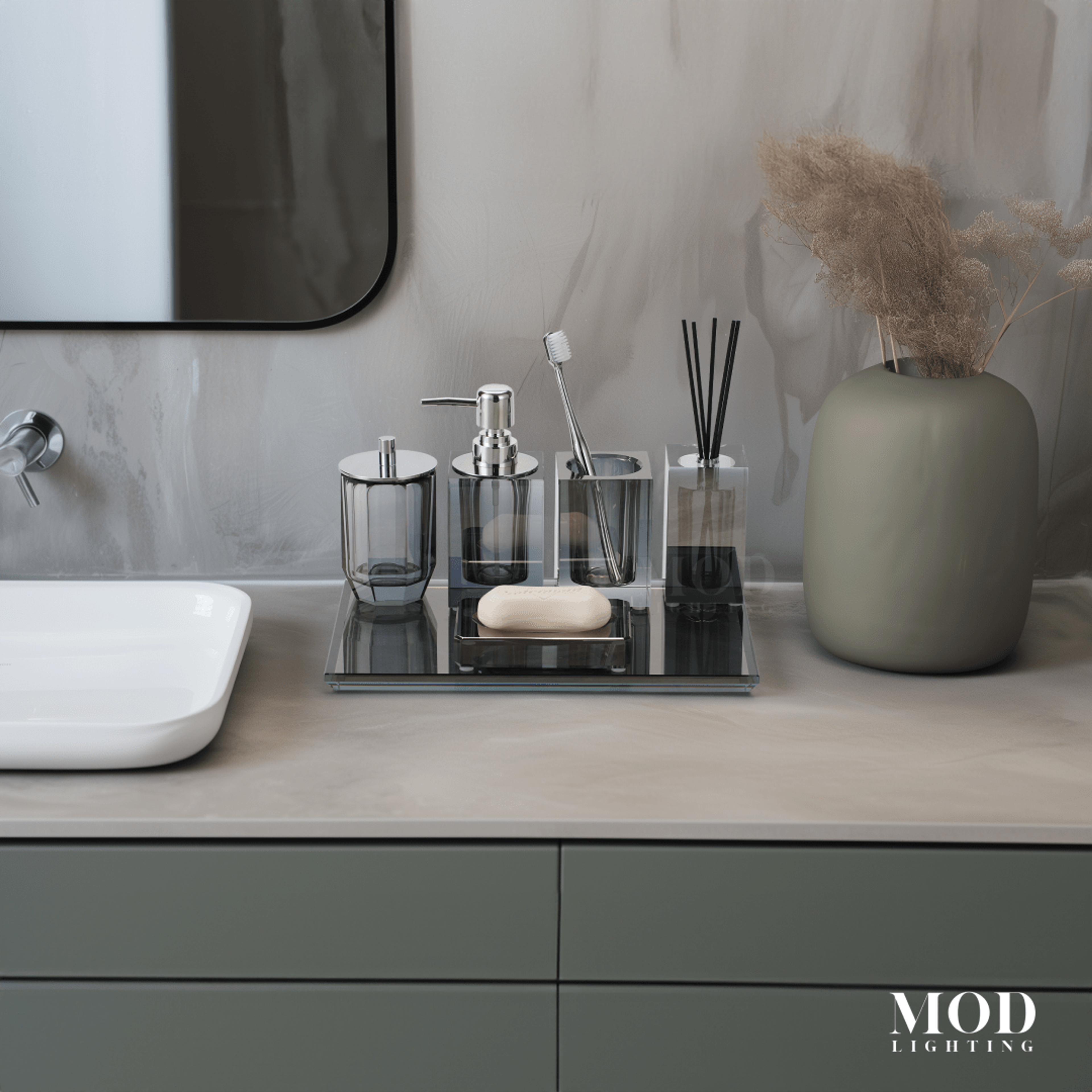Moonlit Crystal Bath Set, smoky grey crystal accessories on a mirrored tray on a light stone vanity with a mirror
