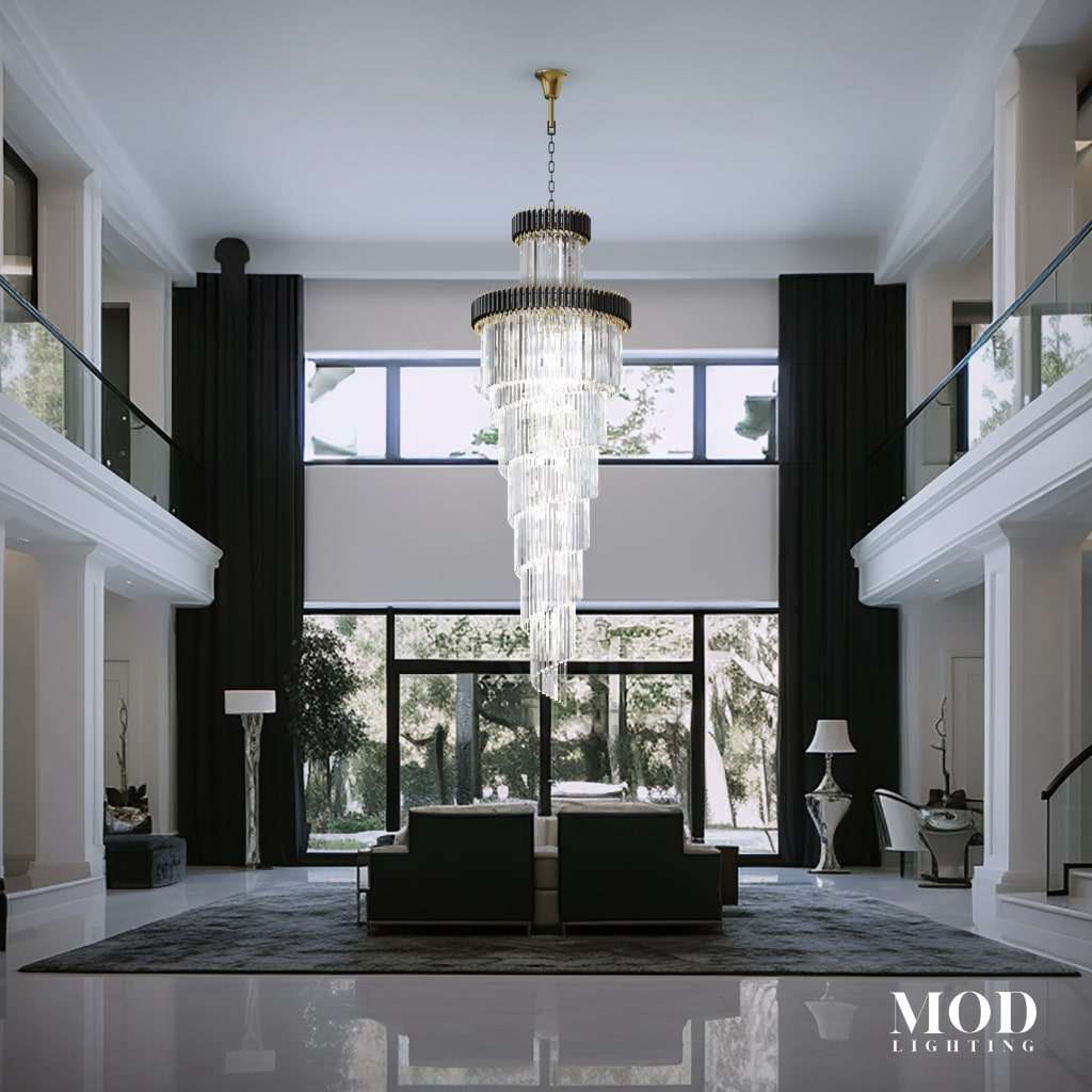 Onyx black-and-gold crystal spiral chandelier cascading in a two-story white living room