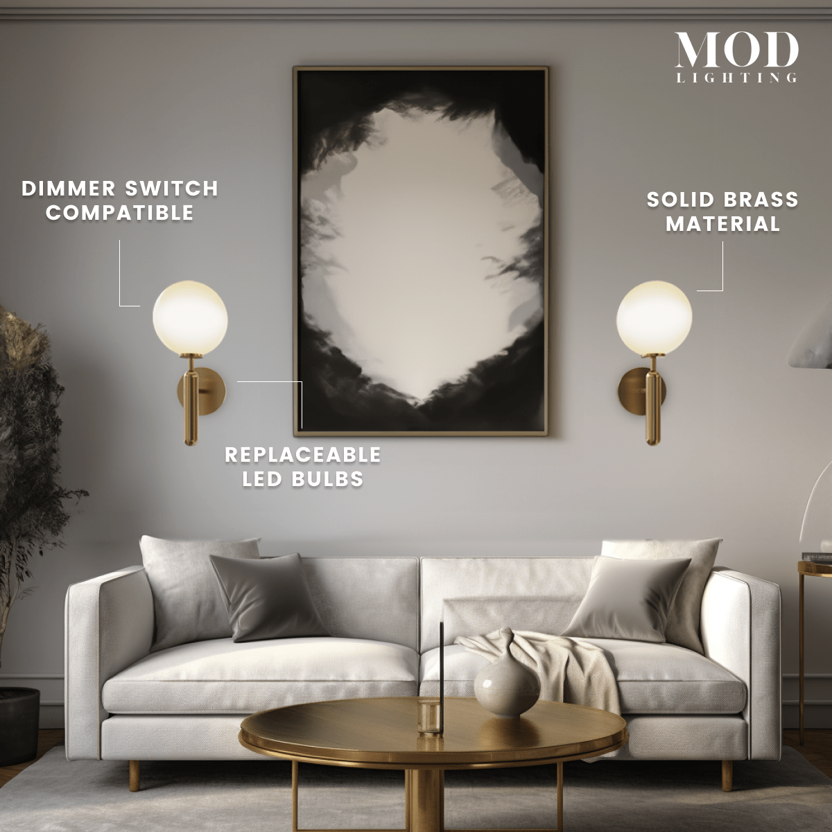 Angelica gold wall sconces, white opal-glass globes on brass arms, flanking artwork above a living-room sofa