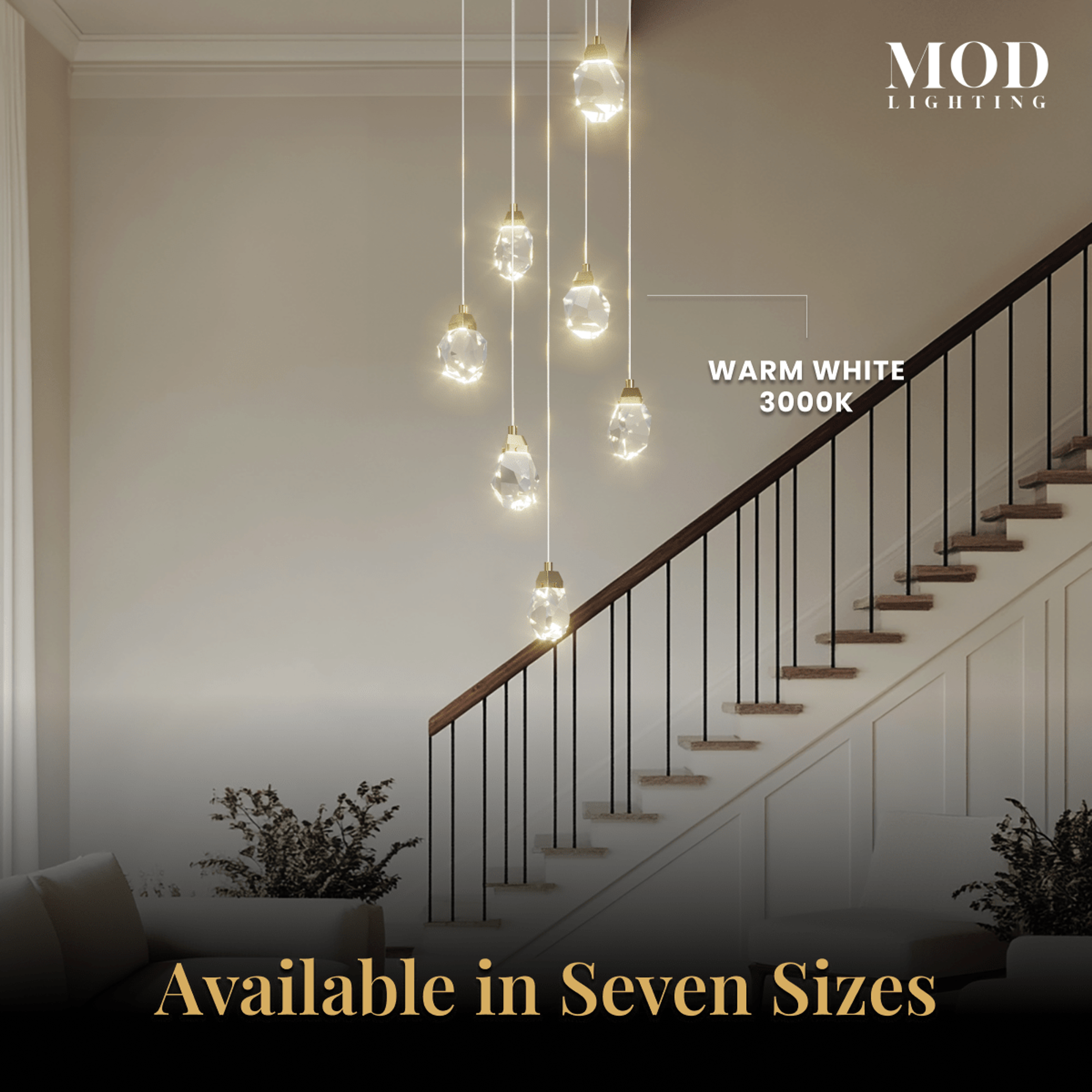 Hailstone cascading crystal-drop chandelier spiraling down a staircase, warm white 3000K, seven sizes