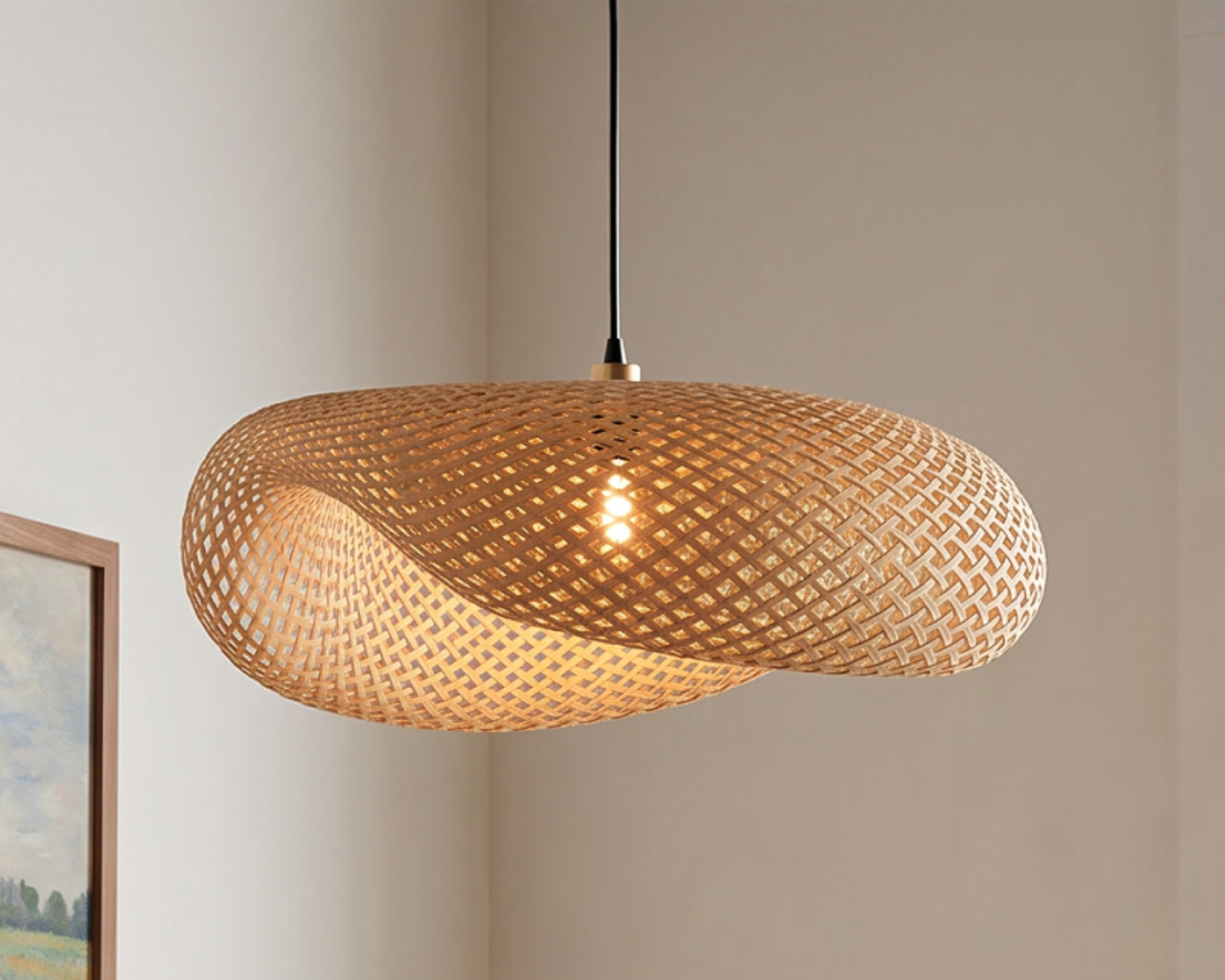 Amara, a woven chandelier, above a console