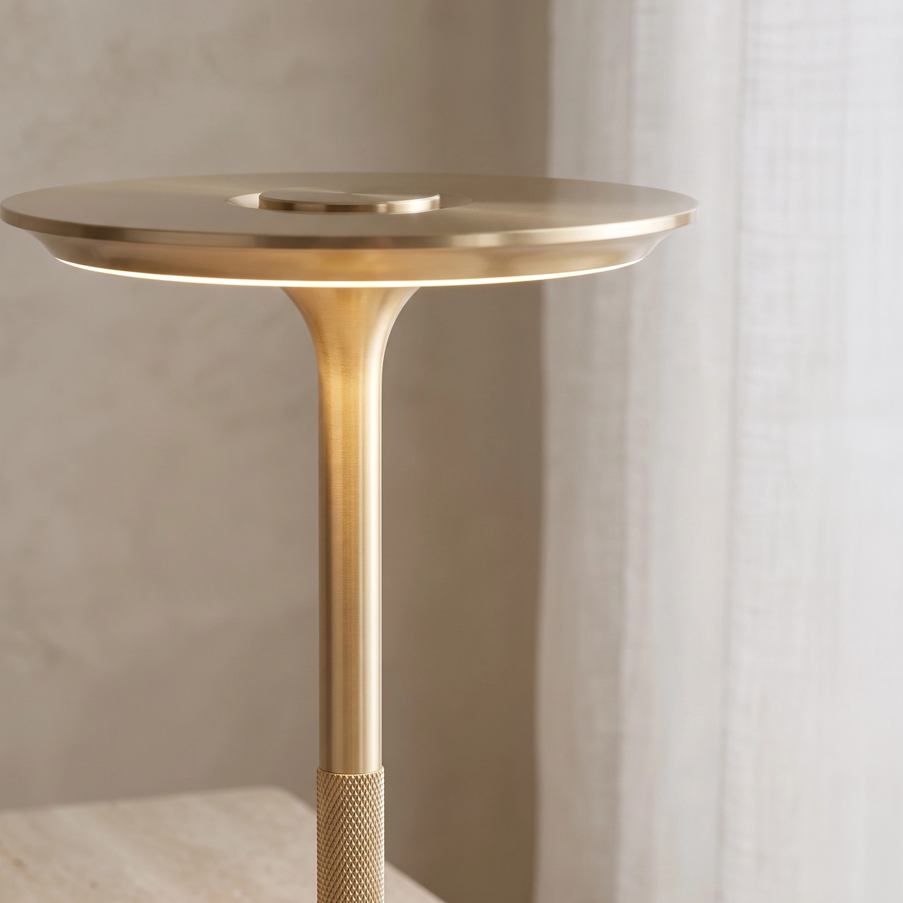 Aris black rechargeable table lamp on a nightstand, callouts for three color temperatures from warm to cool white