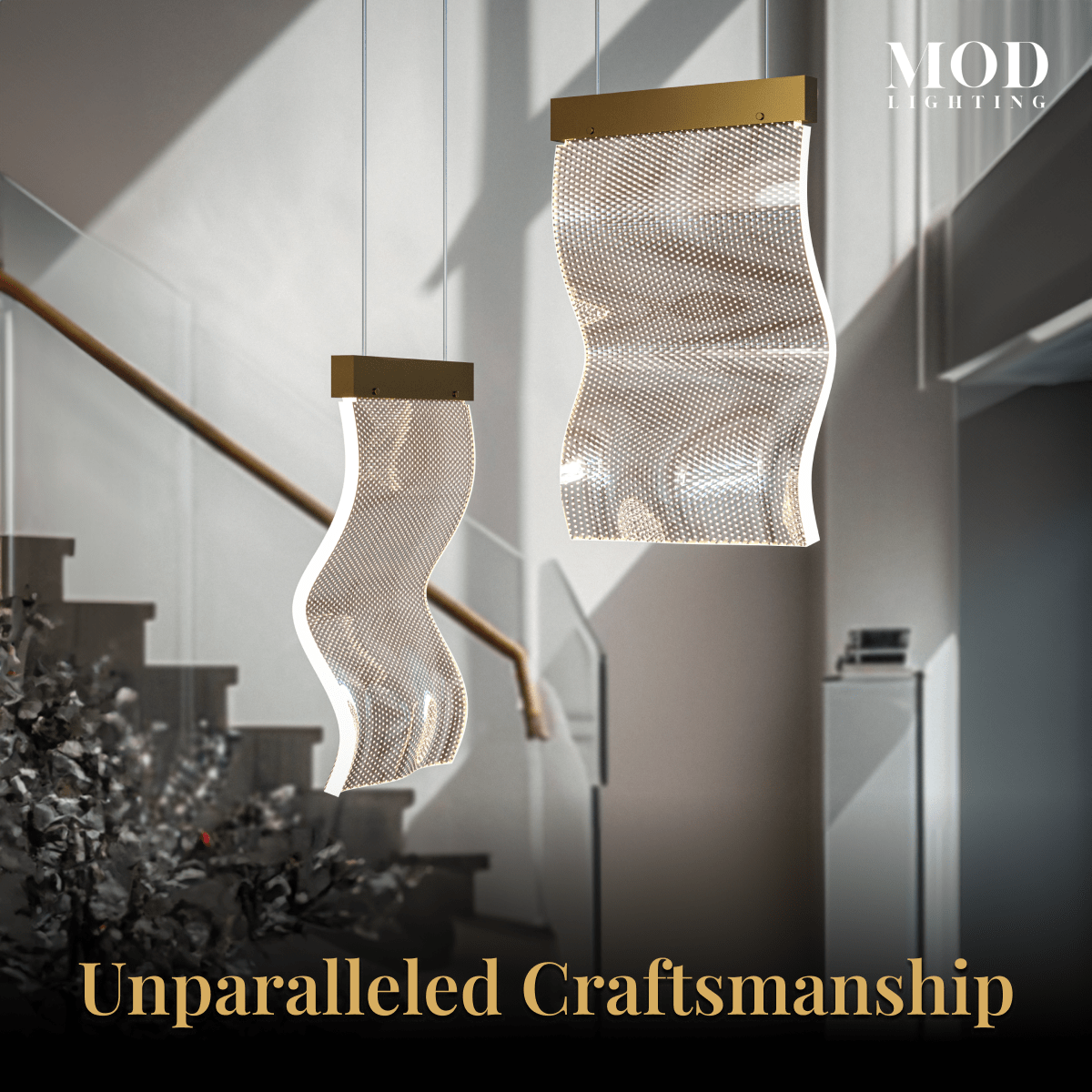 Helia pendants, two wavy ribbed-glass panels on gold mounts, hanging in a staircase