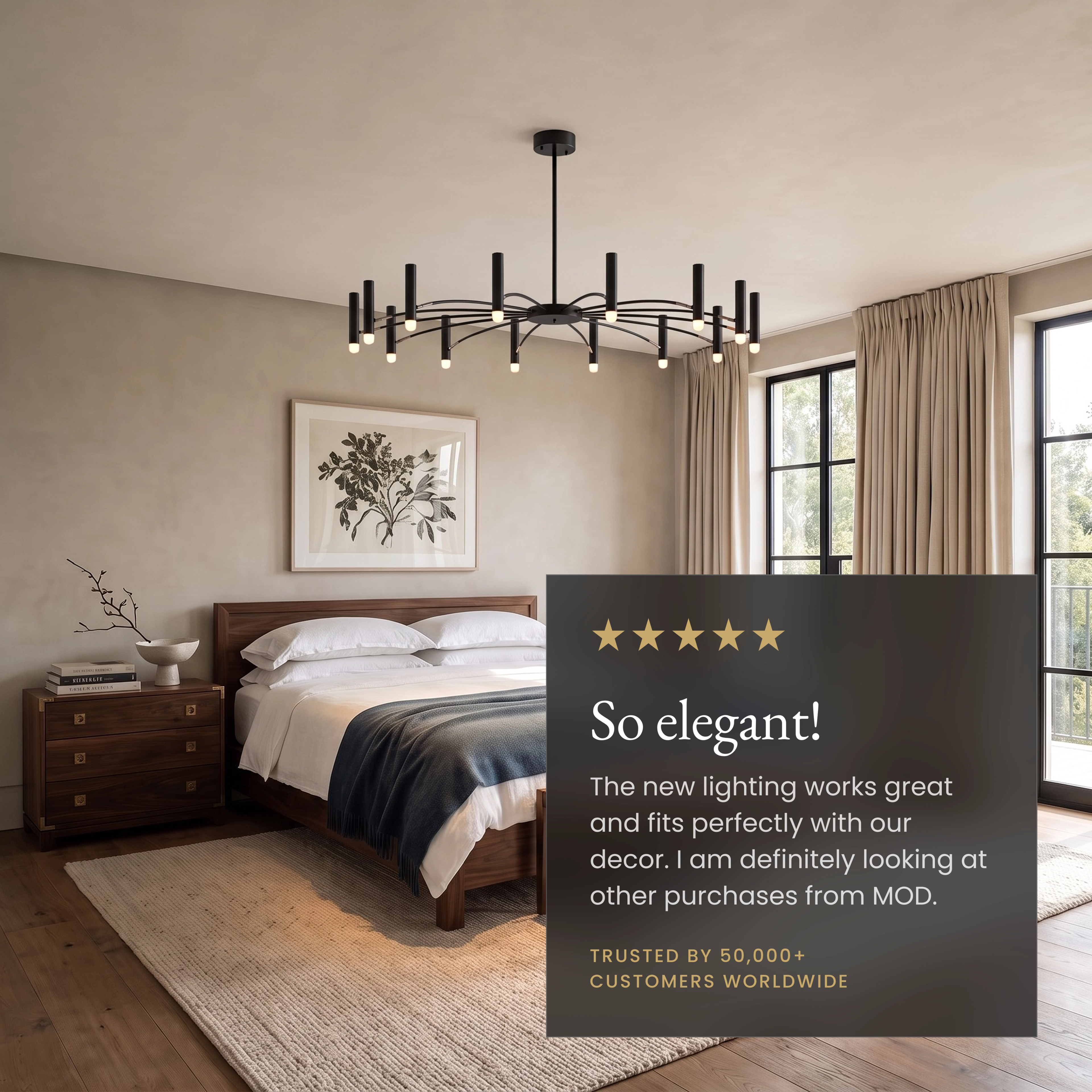 Kendall candle-style chandelier, round black frame with slim upright arms, above a living room