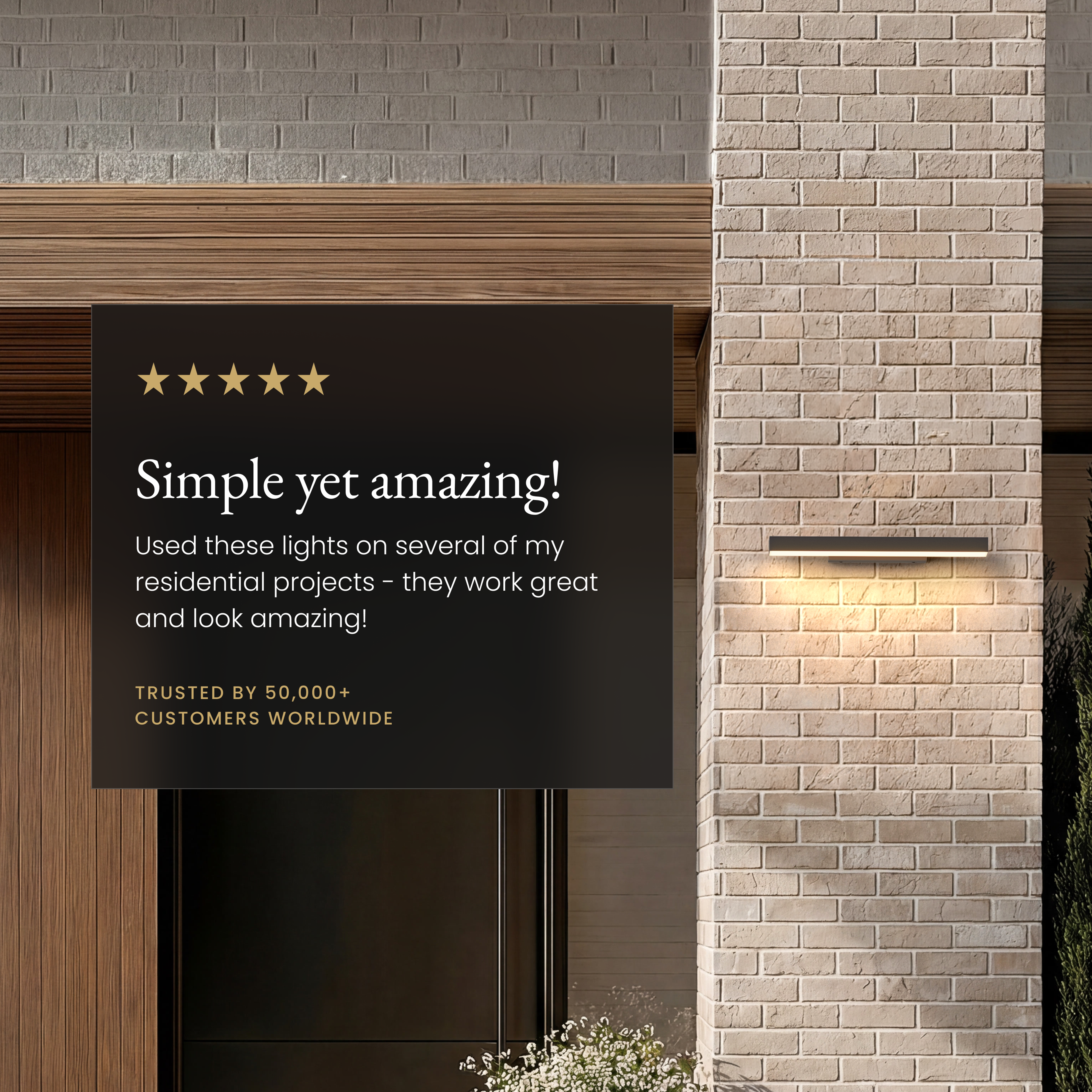 Brook Smart black horizontal outdoor sconce on brick beside a five-star customer review