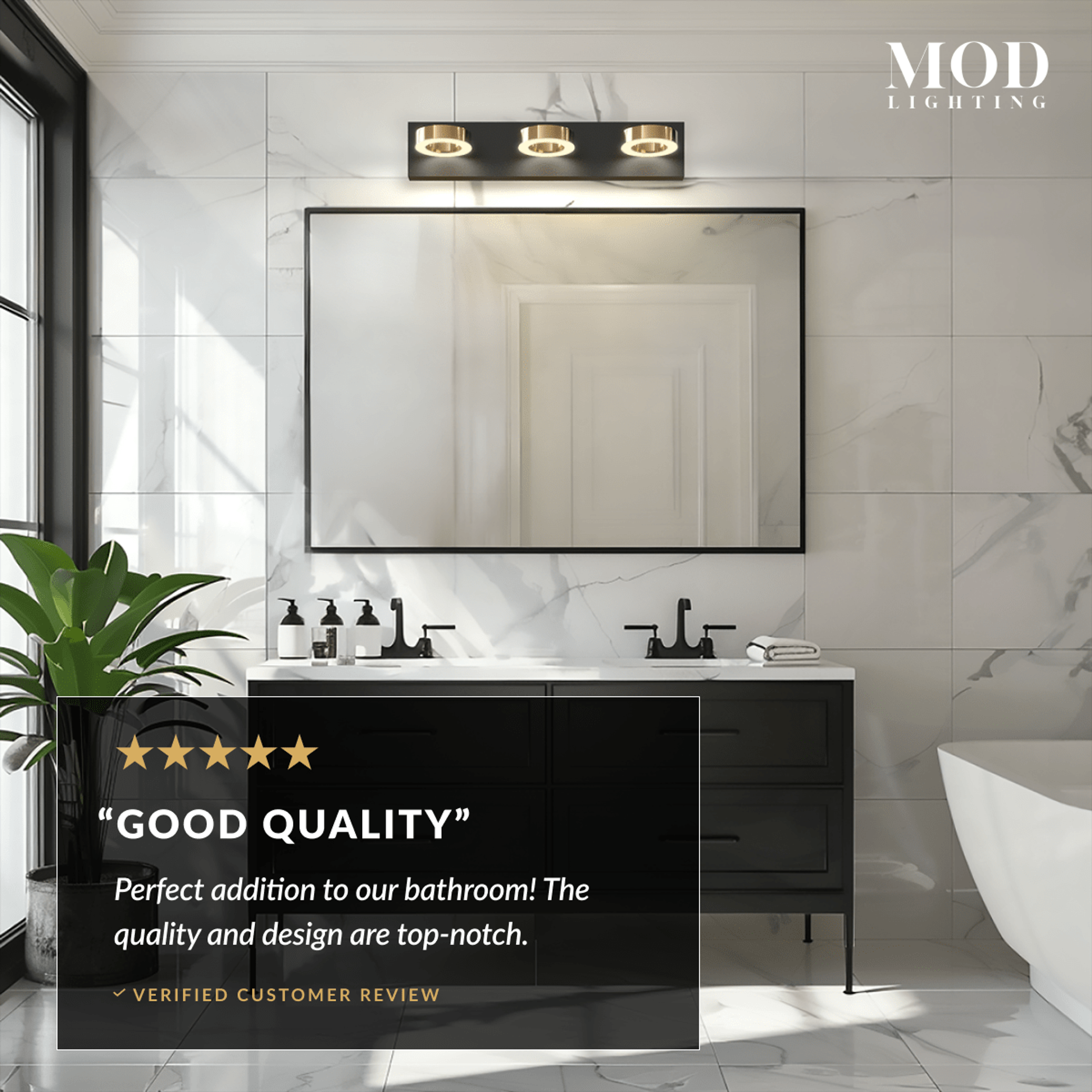 Aurora black bathroom light with three gold-ringed lights over a mirror above a black vanity, with review callout