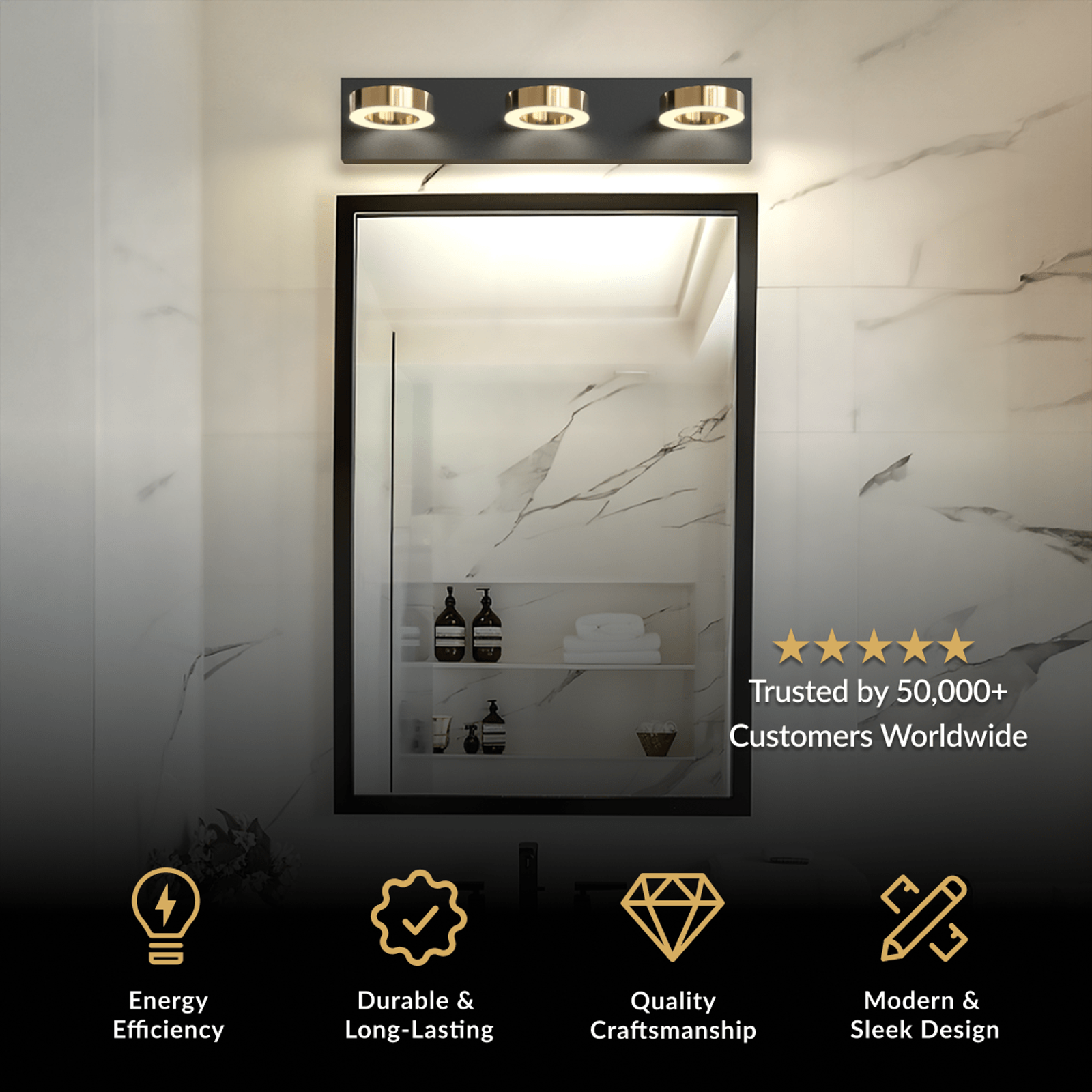 Aurora bathroom light, three circular lights on a matte black bar with gold accents over a black-framed mirror