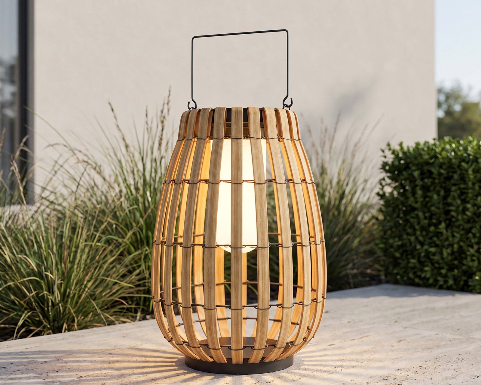Beam, a woven solar lantern, on a travertine terrace