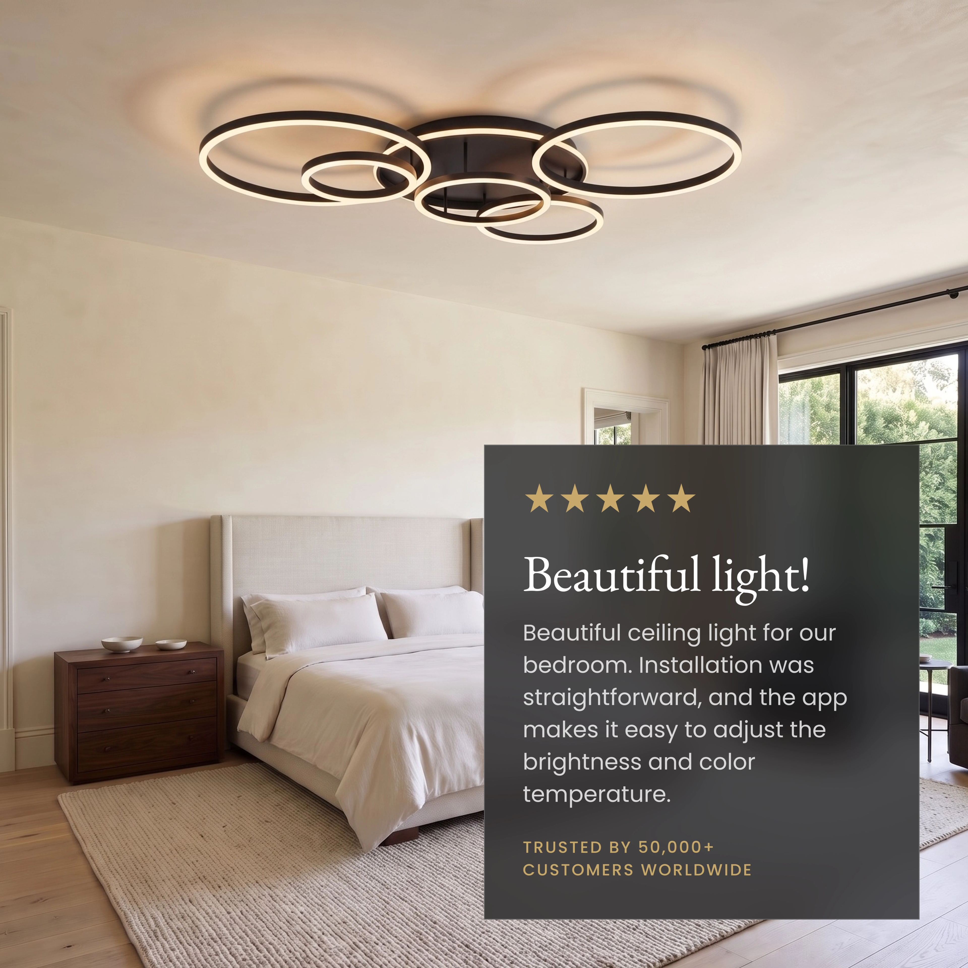 Black Chloe Smart ceiling light in a bedroom with a five-star customer review