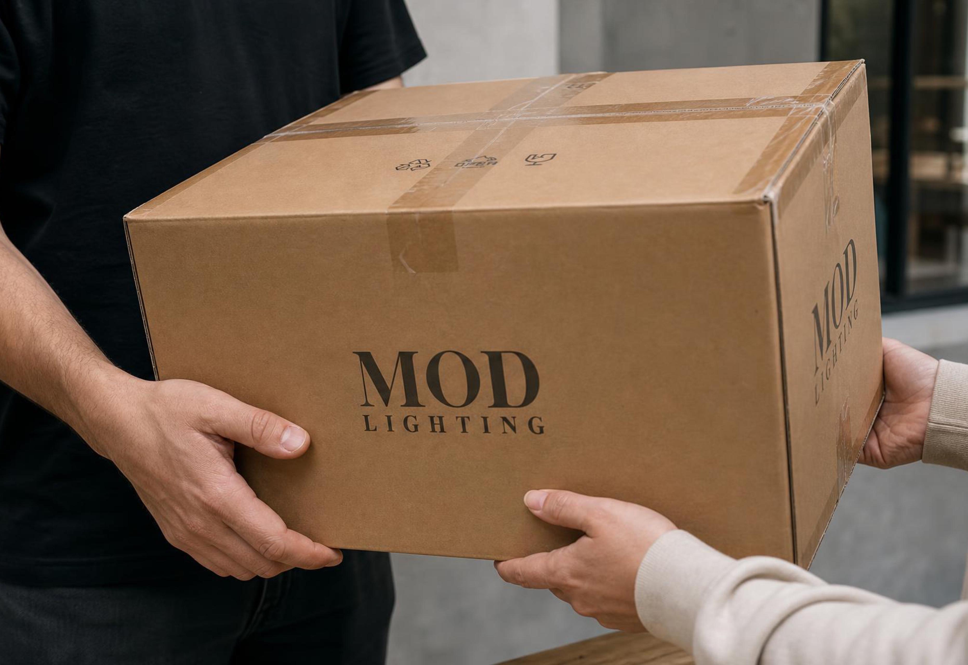 A MOD LIGHTING parcel being handed over at a customer doorstep