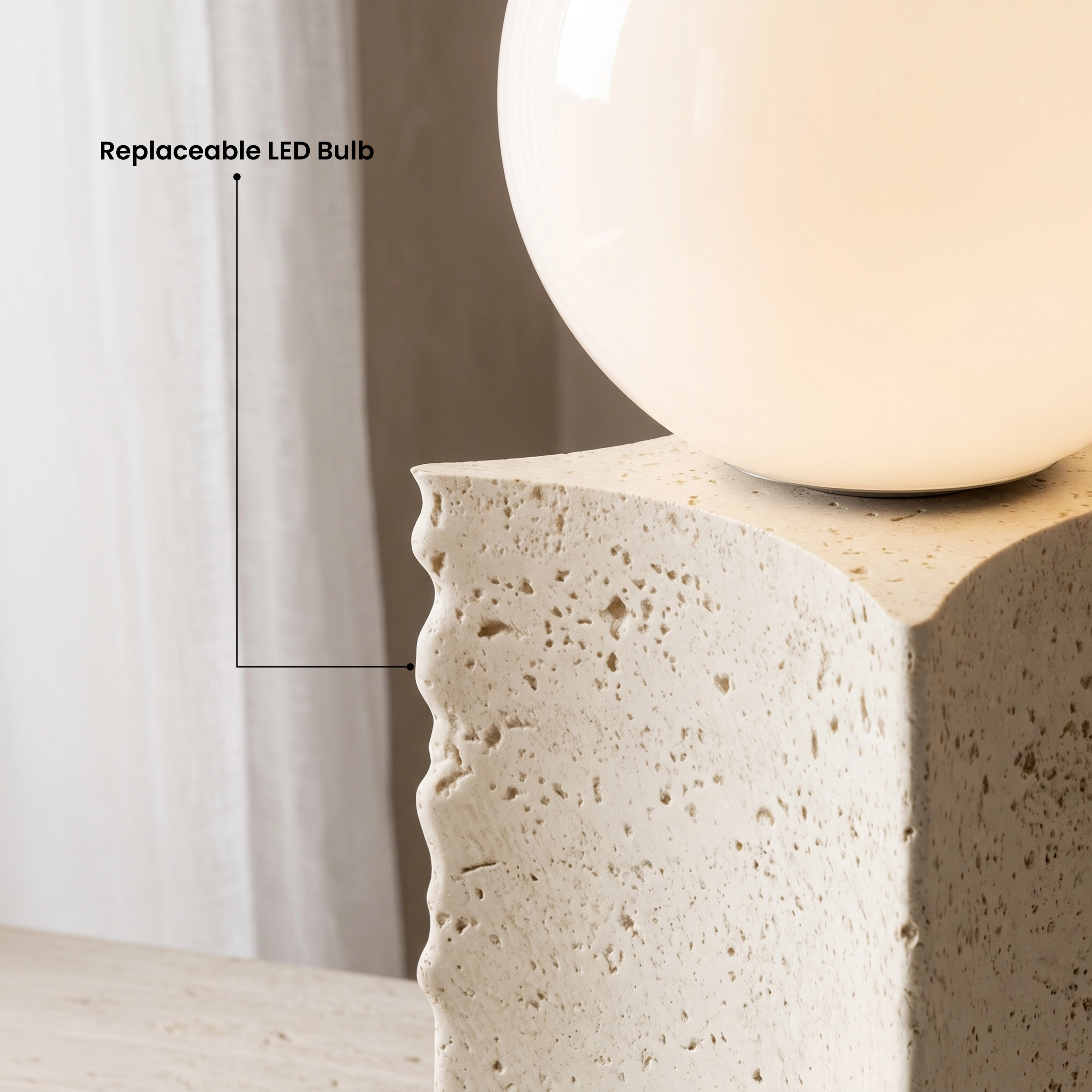 Arabella travertine stone table lamps, rectangular column bases with white glass globes, pair on a console, warm white