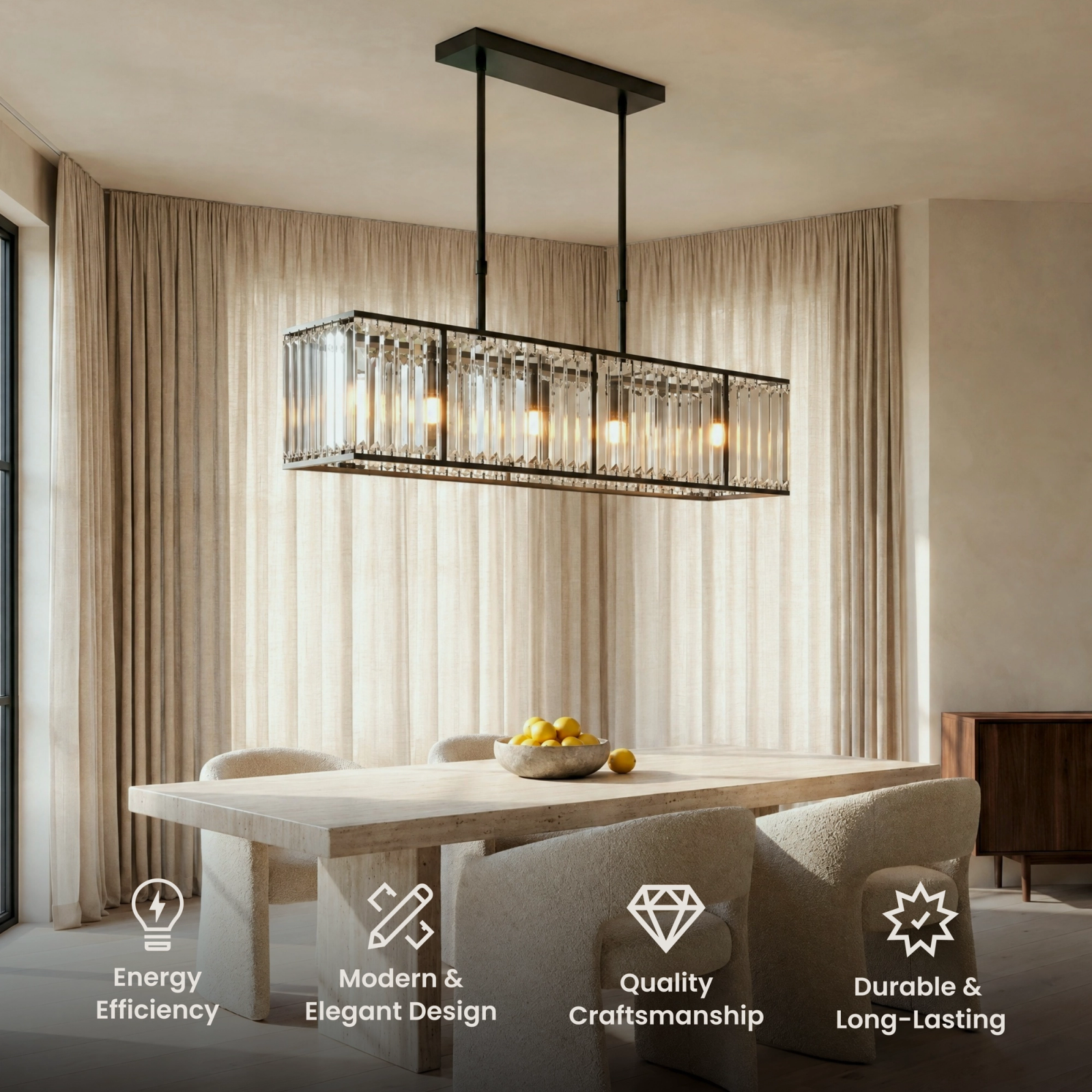 Gabriella chandelier, rectangular fringe of clear crystal rods, suspended over a dining table at dusk