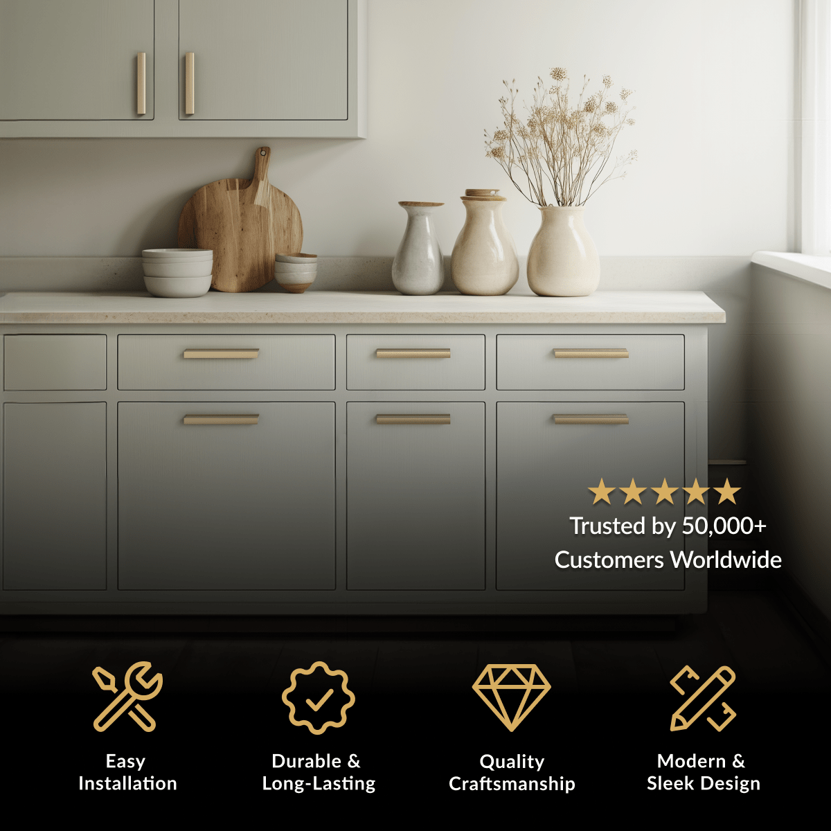 Iris Cabinet Pull in brushed gold, bar pulls on light grey cabinets with a wood countertop and vases