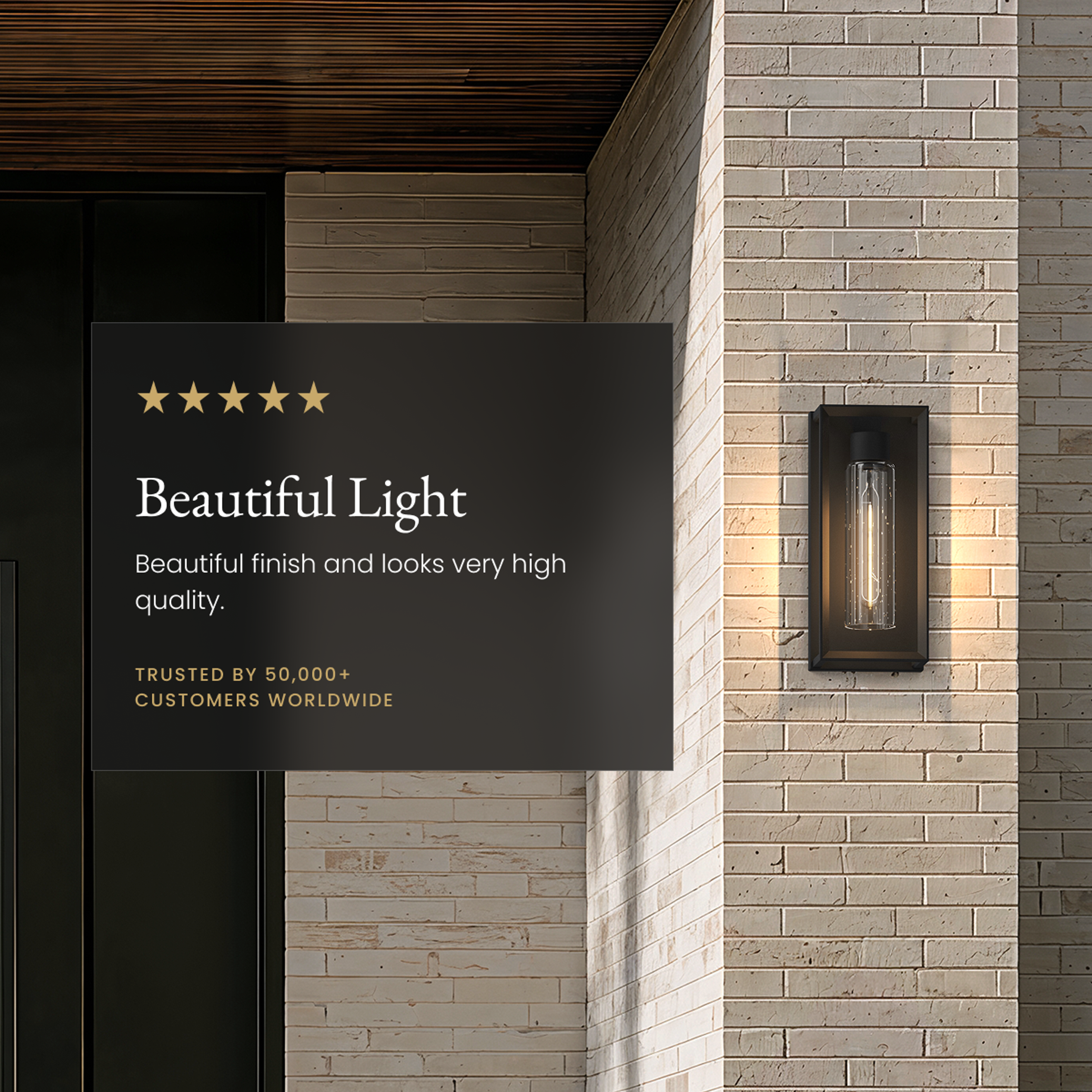 Lux black outdoor sconce with exposed-filament glow on a brick wall, five-star customer review