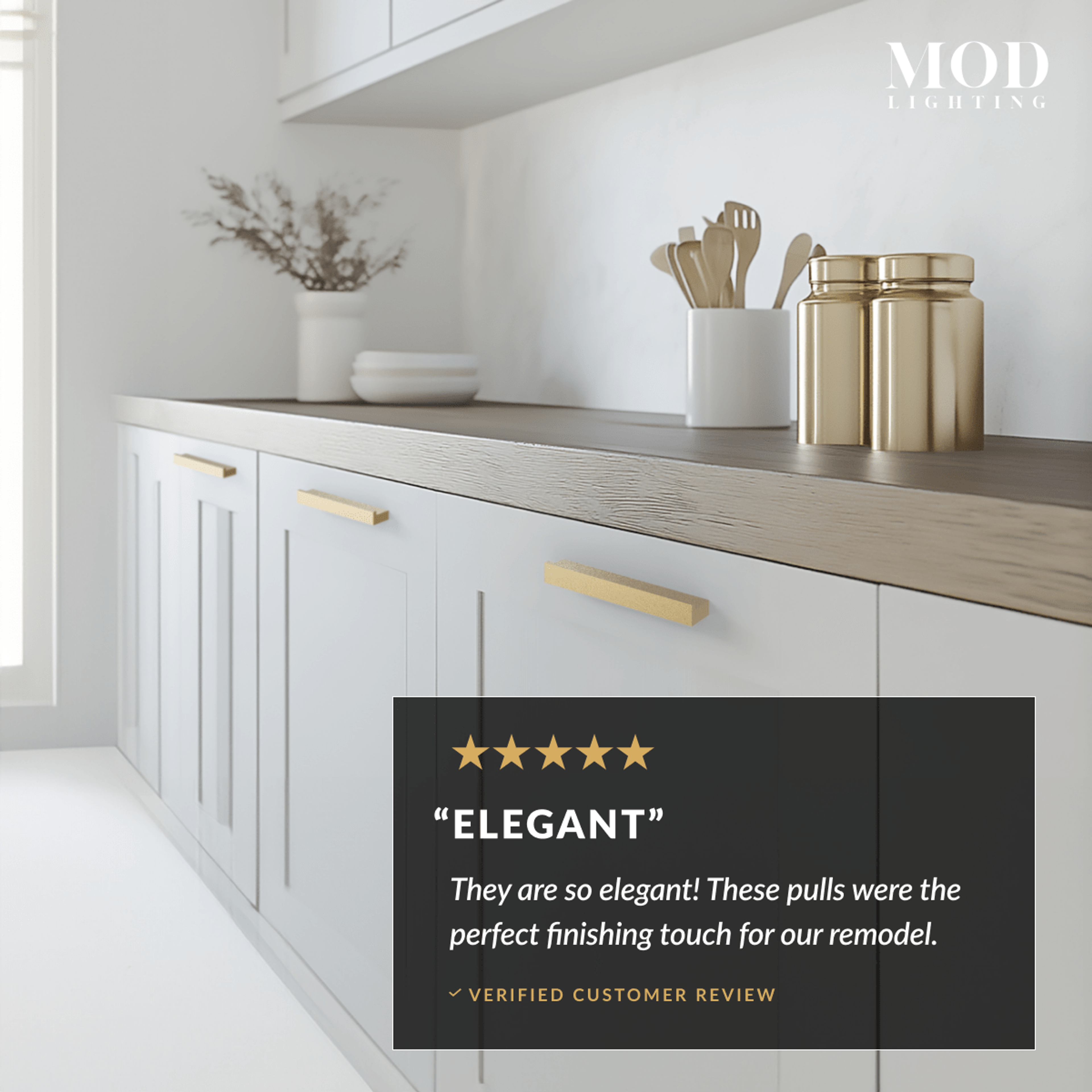 Innis brushed-gold cabinet pulls on white kitchen drawers with a five-star customer review overlay reading Elegant