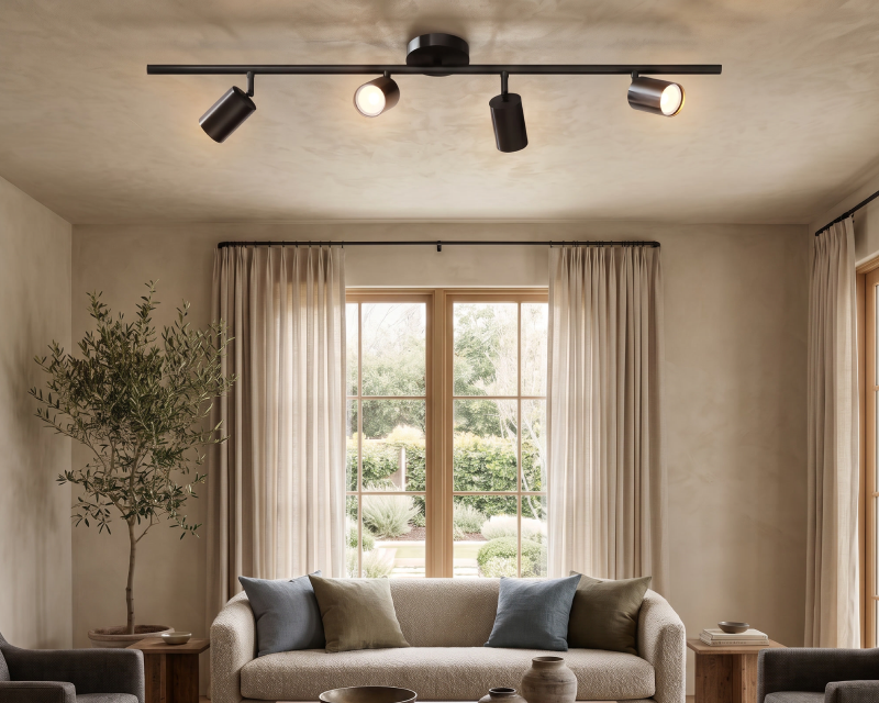 Spiral ceiling light, black rings, in a living room