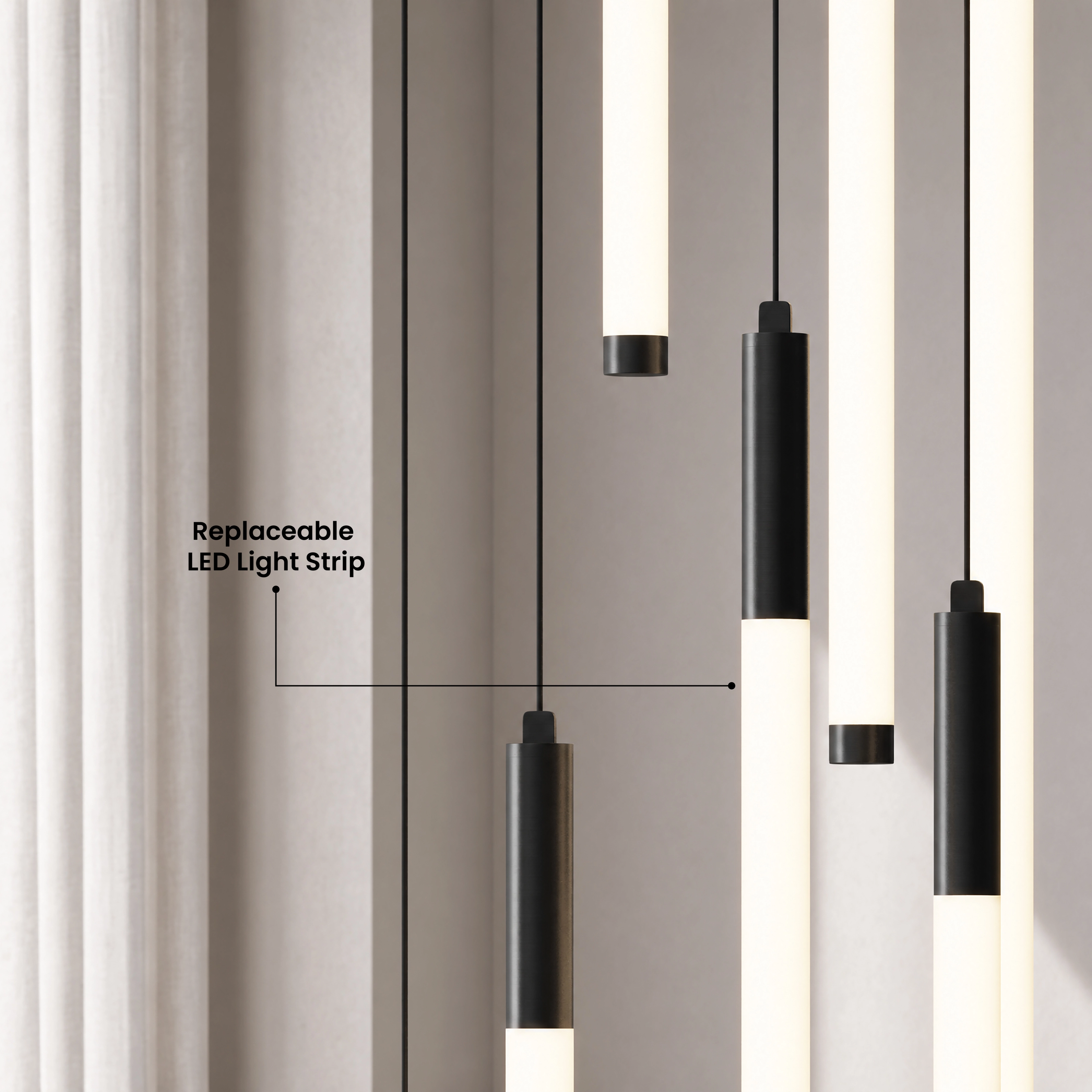 Close-up of the Kasper Smart black pendant tubes with the replaceable LED light strip