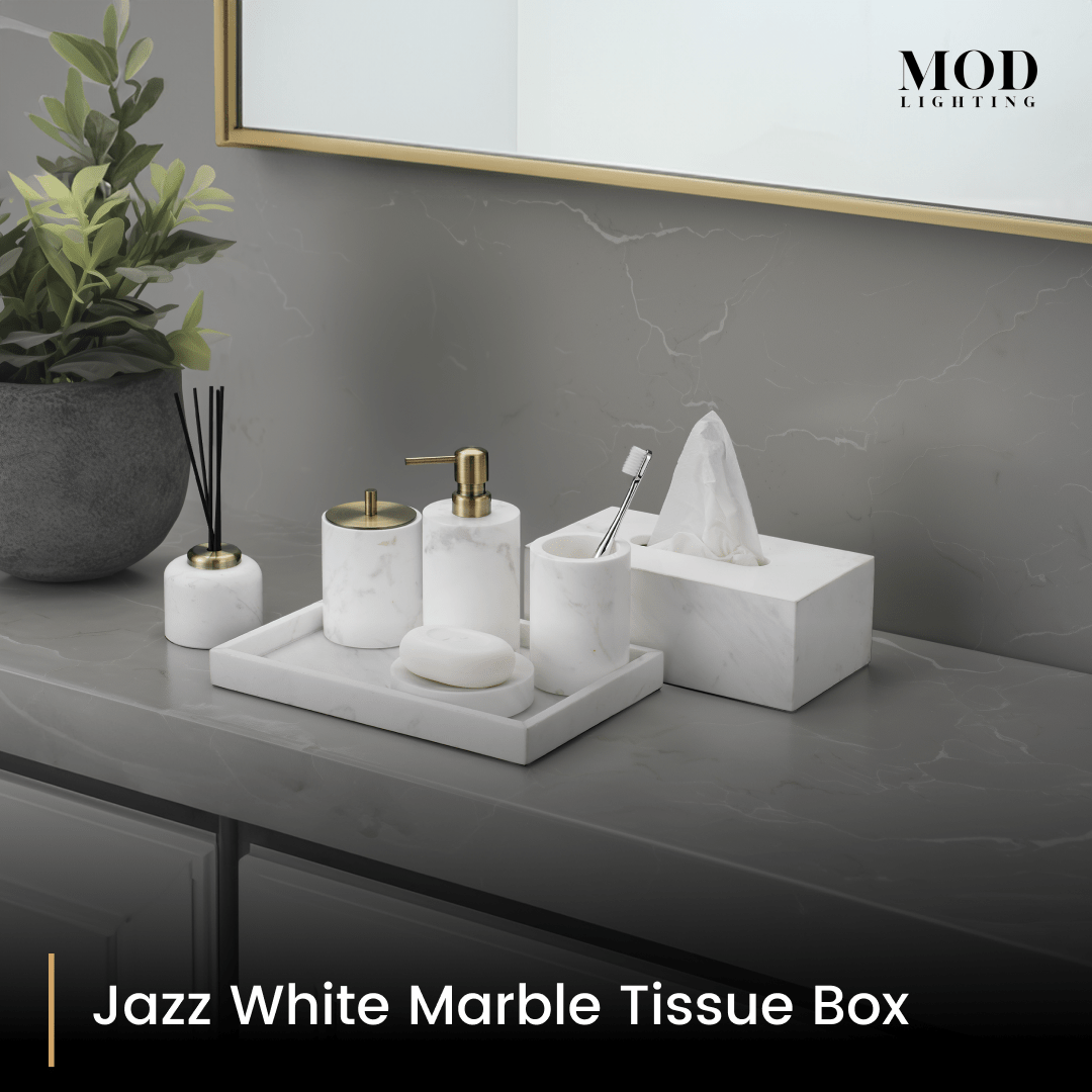 Jazz White Marble tissue box and matching bath set on a tray on a grey vanity below a mirror