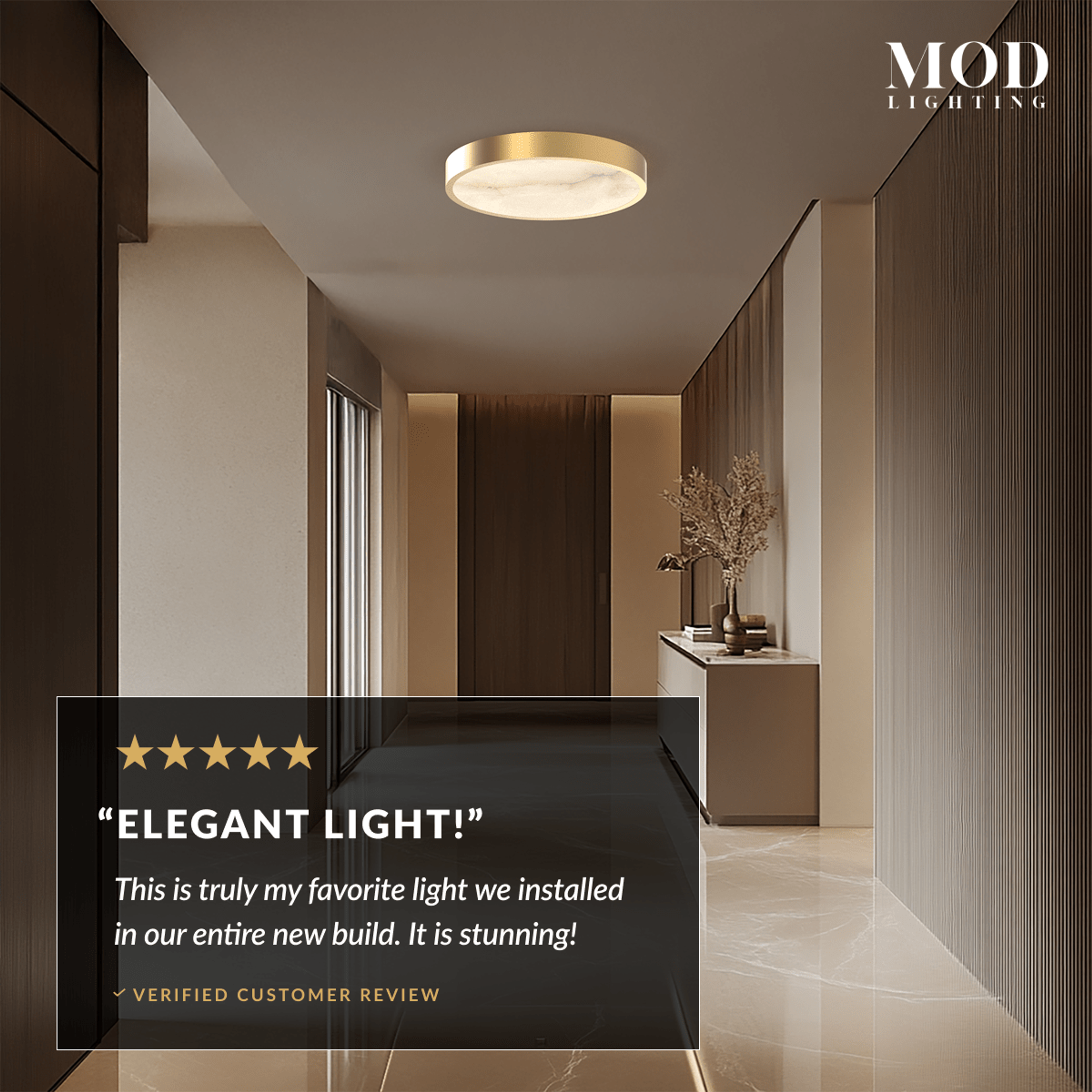 Celia gold round alabaster ceiling light glowing in a hallway with wood and marble walls