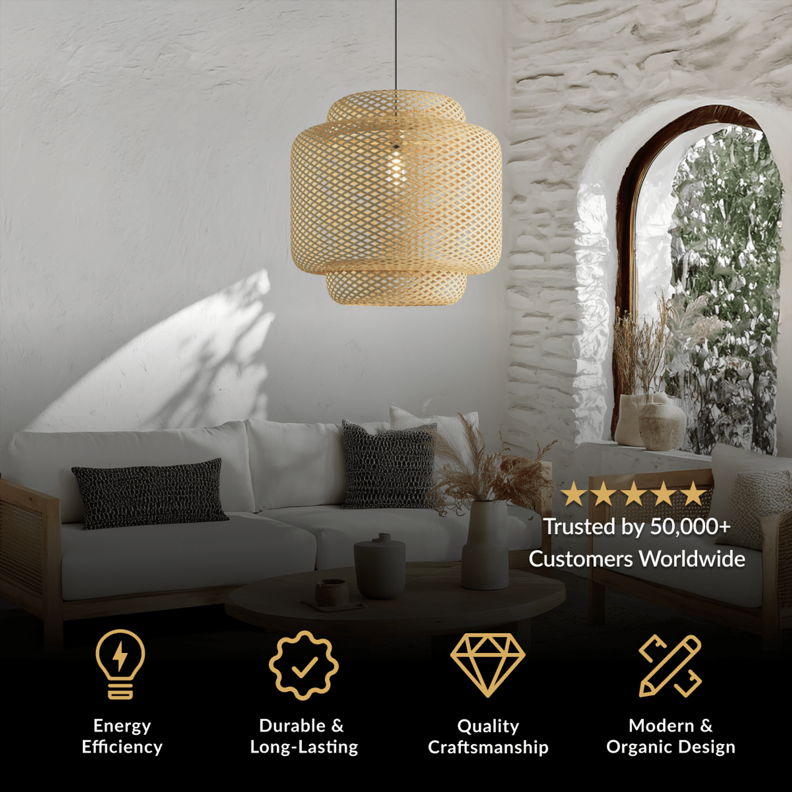 Elva chandelier, bell-shaped woven bamboo pendant with a warm glow over a sofa