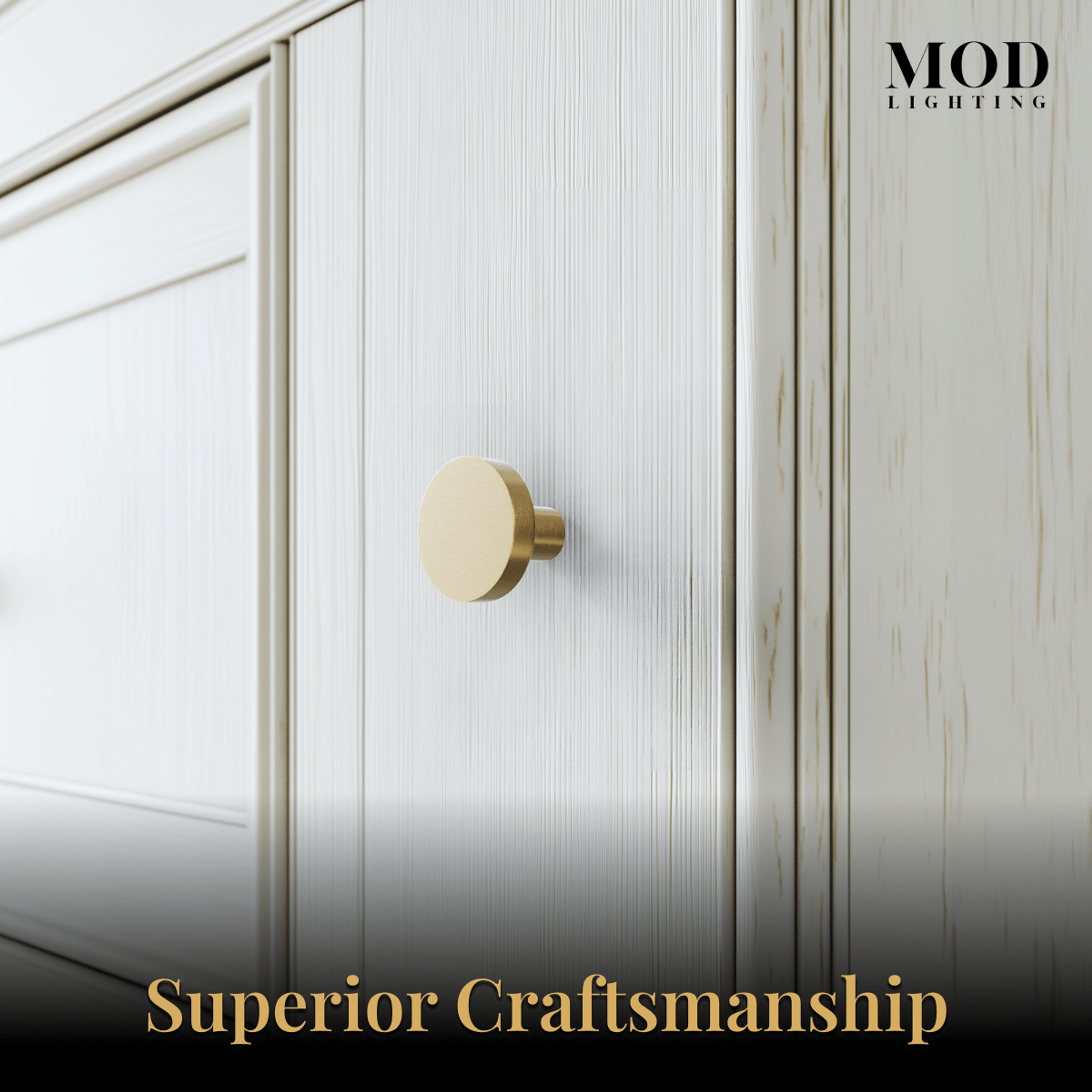 Balmuto brushed-gold flat round cabinet knobs on gray cabinet drawers in a stone-backsplash kitchen