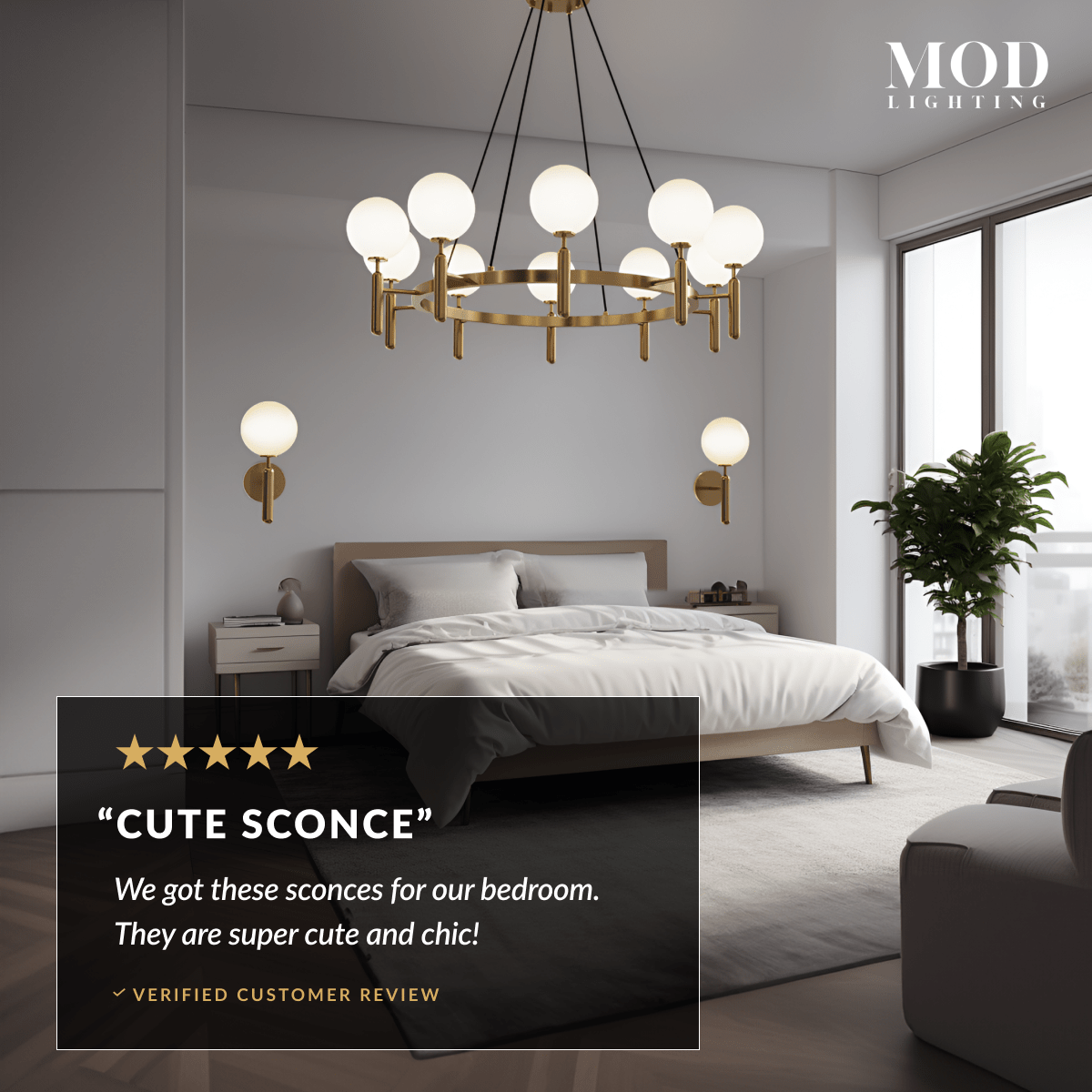Angelica gold wall sconces, white opal-glass globes on brass arms, flanking a bed in a bedroom