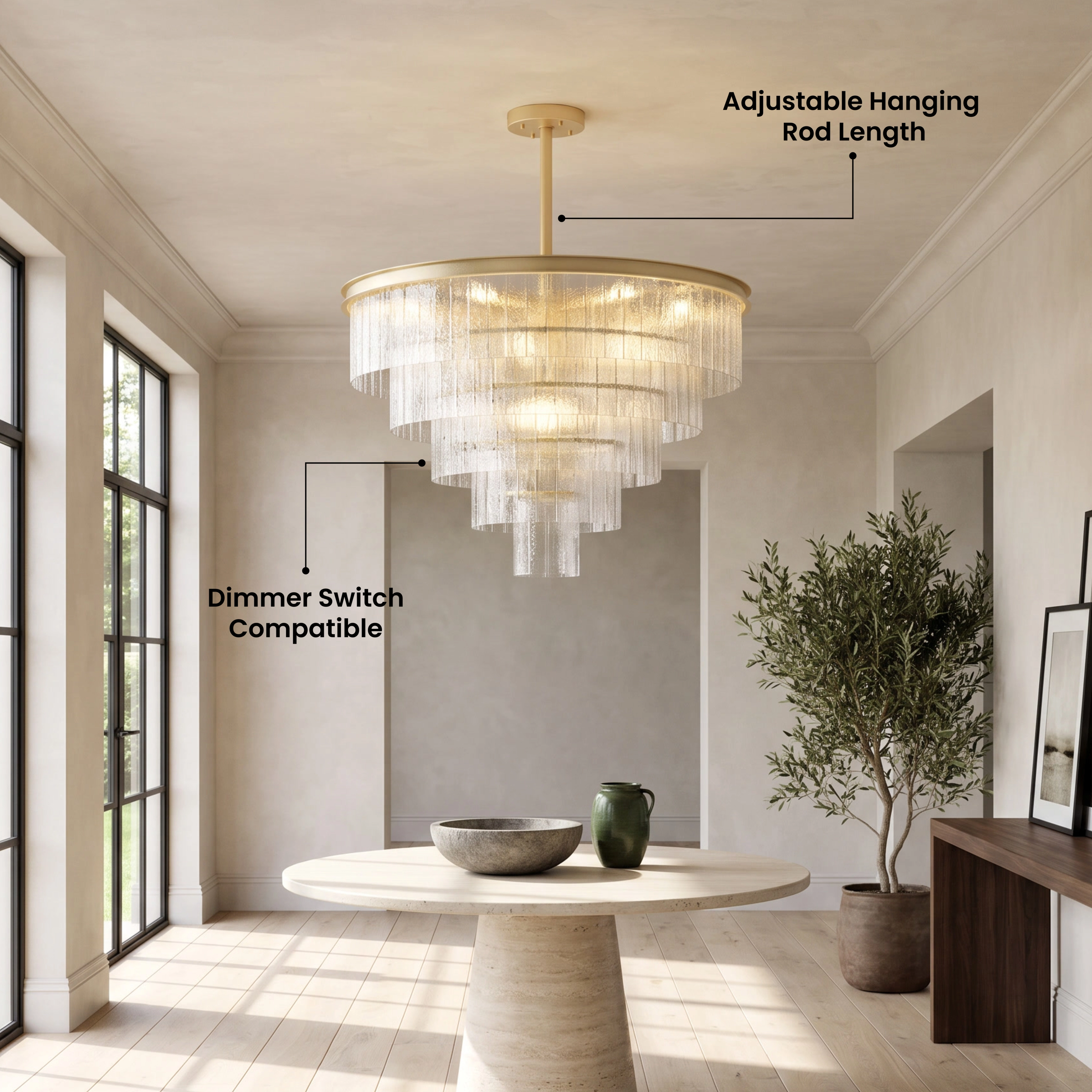 Cascade brass chandelier with tiered textured-glass fringe hanging in a bright modern living room