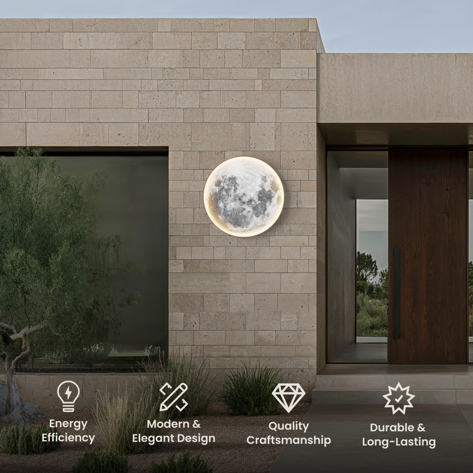 Luna round moon-surface LED wall light mounted on stone facade of a modern home exterior