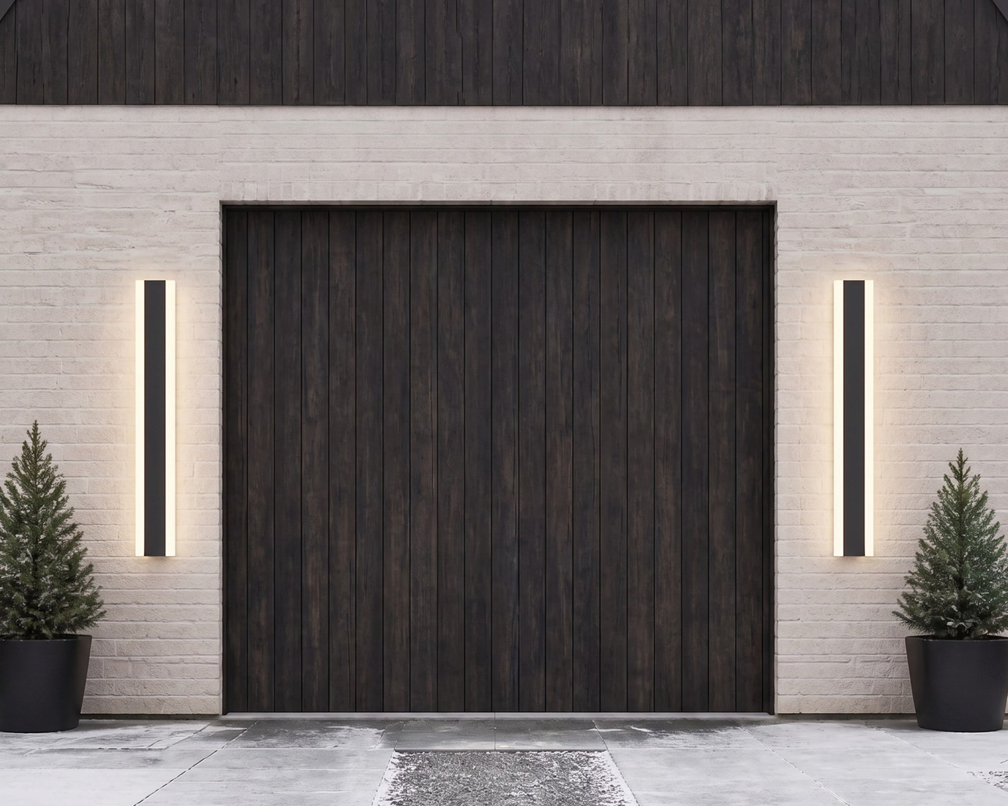 Haylen linear wall lights flanking a garage door