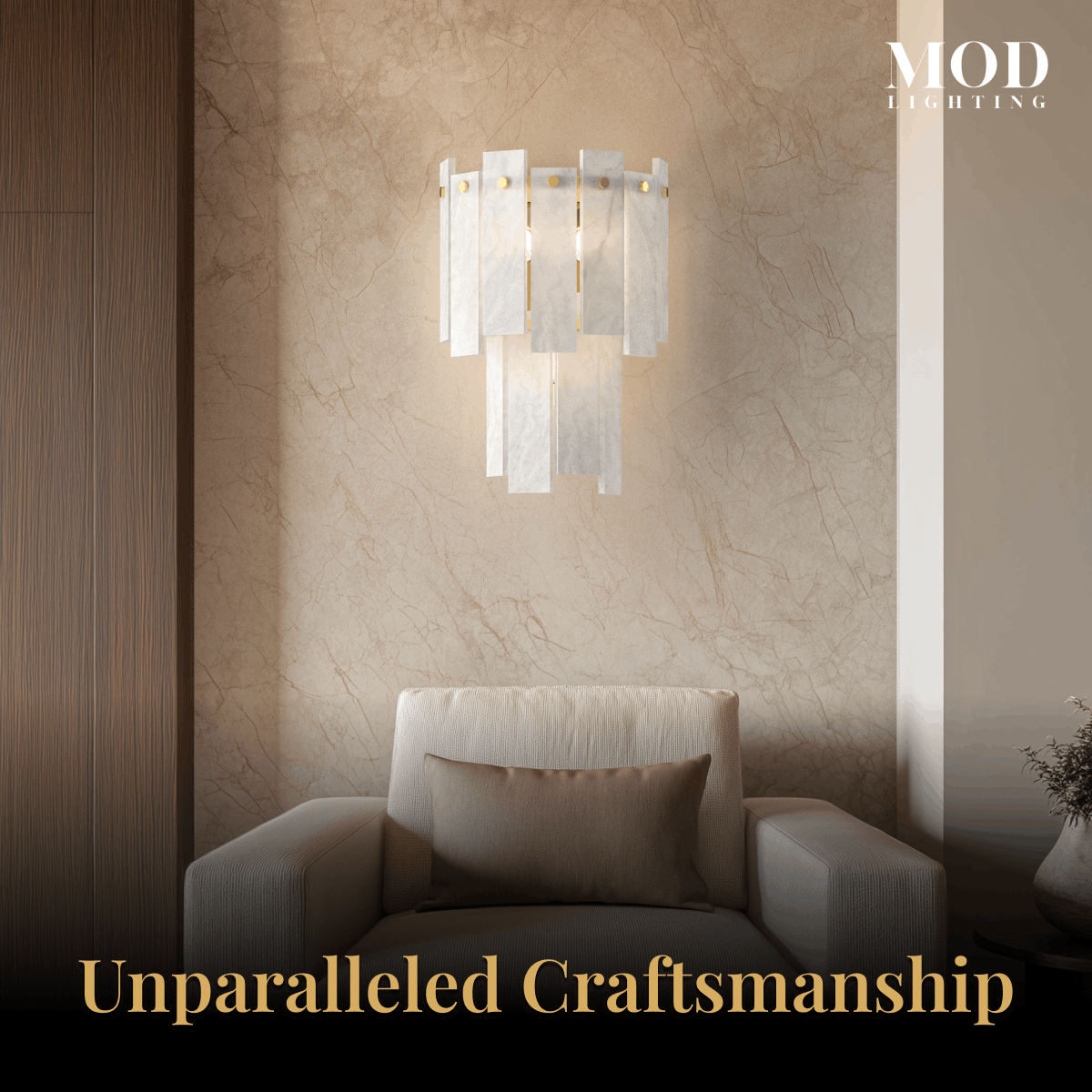 Velina Sconce gold wall light with layered alabaster panels above an armchair in a warm-toned room