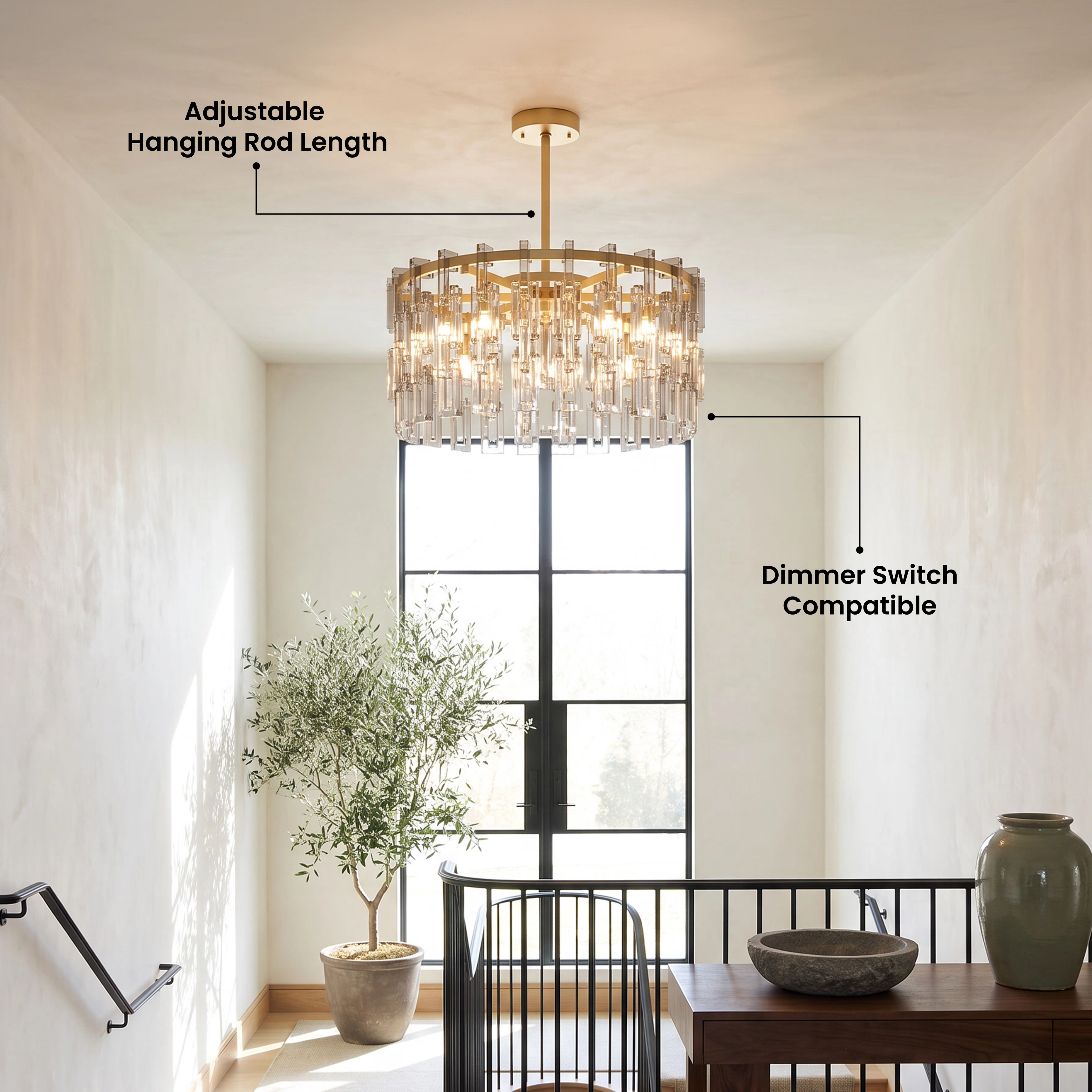 Radiance brushed-gold drum chandelier with layered clear crystal rods over a living room seating area